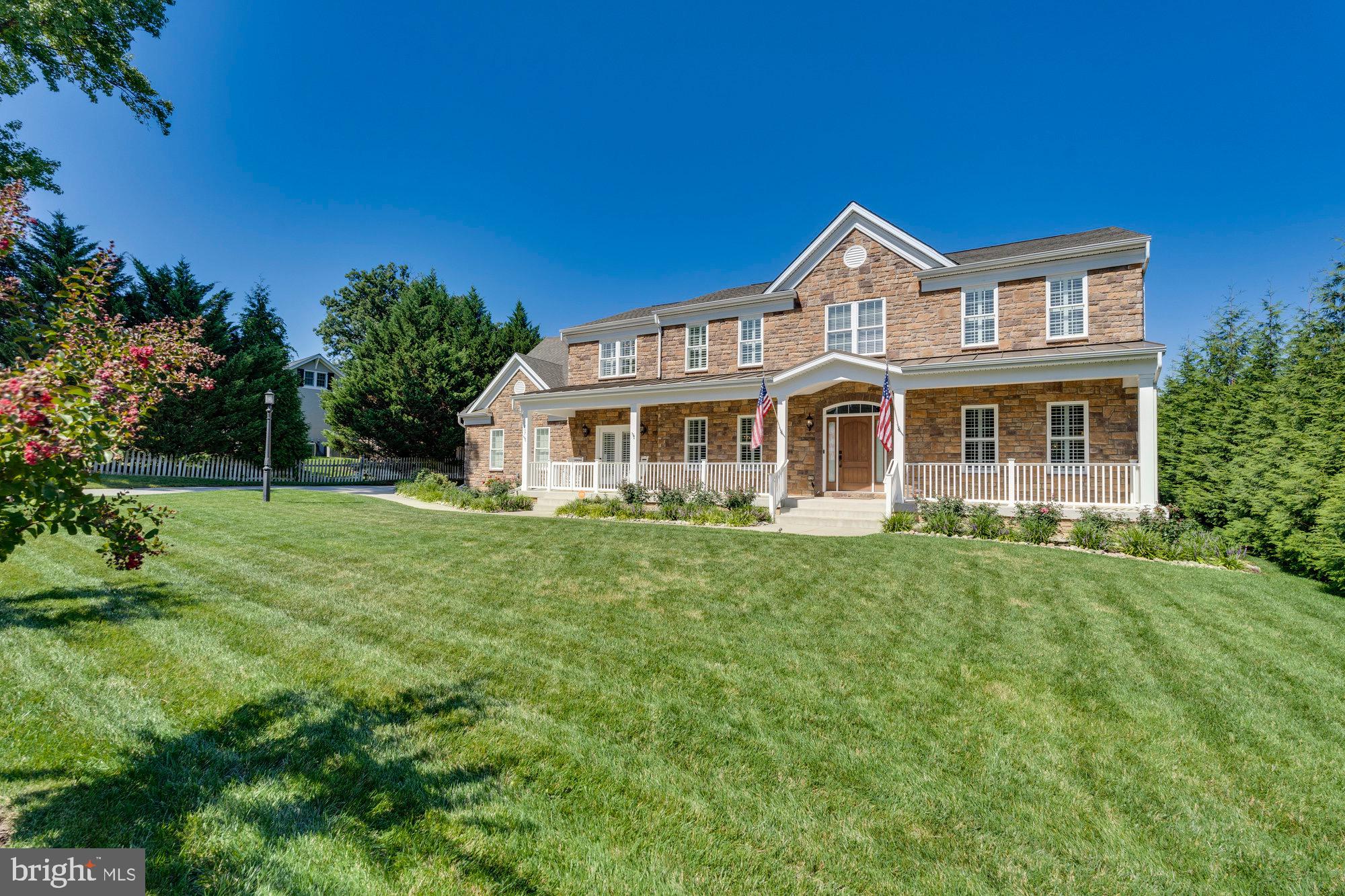 Exquisite custom built home in the sought after Ballantrae community. This home boasts 5 bedrooms, 4.5 baths, 5,405 finished square feet over three levels and sited on a resort-like .66 acre lot. The front porch welcomes you into an open floor plan that is designed for seamless entertaining and features a spacious living room, dining room, butler’s pantry, and family room. The gourmet kitchen is a chef’s dream with top-of-the-line stainless steel appliances and a cozy breakfast room. The owner’s suite is a luxurious retreat complete with a spa-like ensuite bathroom, sitting room, and a walk-in closet. Upstairs, you’ll also find three additional bedrooms and two full bathrooms. The walk-up lower level is a perfect space for entertaining with wine storage, wet bar, recreation room, 5th bedroom, and full bathroom. The fully fenced lot is an outdoor oasis with a covered back deck, outdoor shower, patio, and fire pit. This yard design might seem familiar to you as it was inspired by the beautiful gardens at the Inn at Perry Cabin, which is famously known as the primary location for the hit movie 'Wedding Crashers' in St. Michaels, Maryland. This home truly has it all and is perfect for those who value luxury and comfort. All this and in a great Alexandria location close to historic Old Town, Del Ray, King Street Metro and Washington, DC.