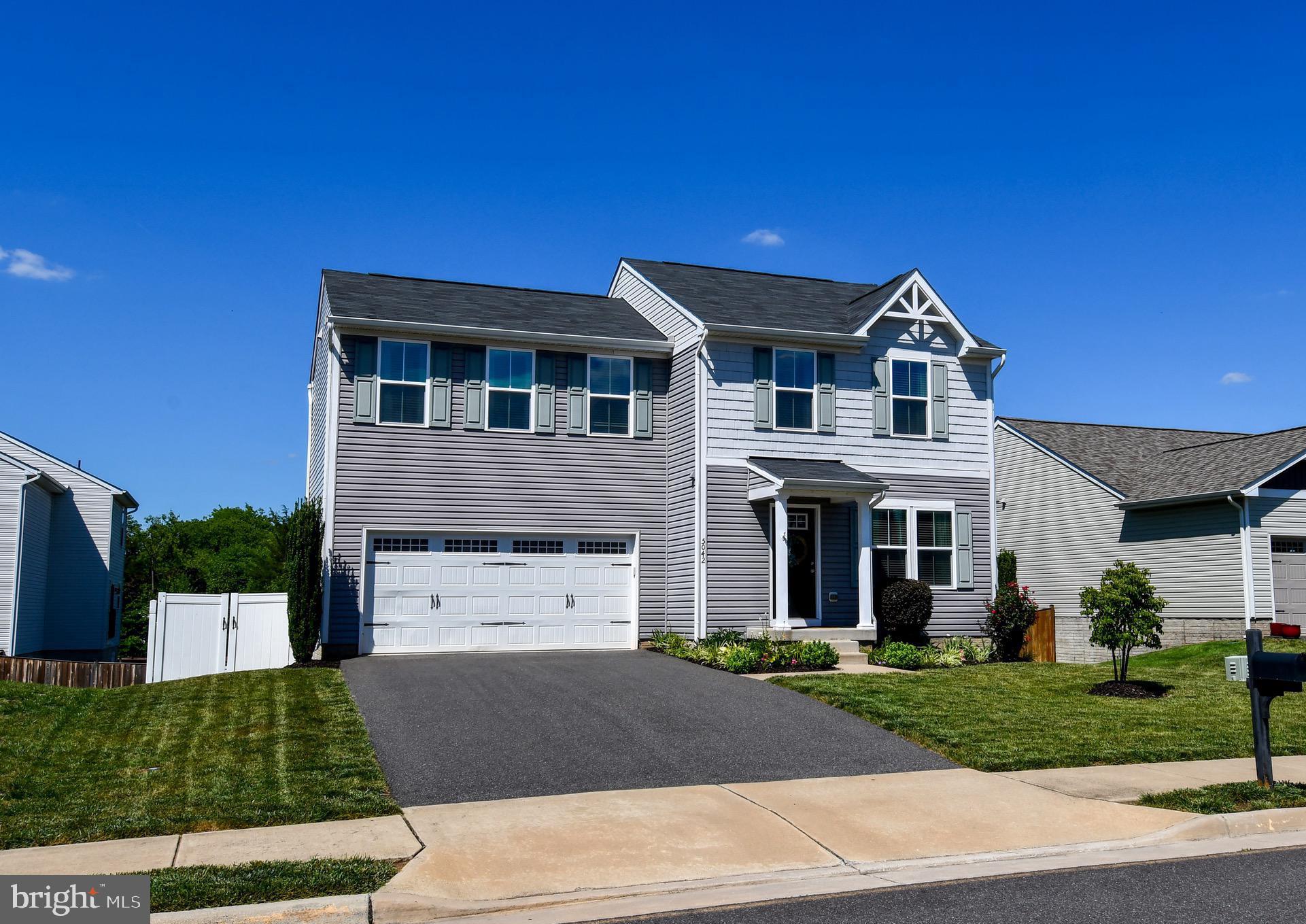 Welcome to this beautifully updated 4-bedroom single-family home in the charming town of Remington, where small-town living meets modern comfort. Just a short walk to downtown Remington and the Rappahannock River, this move-in ready home offers the perfect blend of style, space, and convenience in a highly sought after modern contemporary farmhouse style that blends timeless warmth with clean, current design. Truly nothing you need to do but move in!   An amazing feature of the property is the large, long, and wide driveway, offering exceptional parking space for multiple vehicles, guests, and recreational use!   The heart of the home is the stunning kitchen, completely remodeled in 2023 with custom plywood cabinetry, gorgeous Silestone quartz countertops and waterfall backsplash, a farmhouse sink, recessed lighting, hardwood flooring, and stainless steel appliances. The open-concept main level flows seamlessly between the kitchen, dining, and family room, creating a bright and inviting space ideal for both everyday living and elevated entertaining. Additional recessed lighting throughout the main level enhances the modern contemporary farmhouse feel, balancing warmth with a clean and sophisticated aesthetic.   Throughout the home, you will find numerous upgrades including fresh paint, updated light fixtures, new trim, hardwood flooring on the main level, and an updated half bath. New window panes were installed throughout the home in 2025/2026, enhancing both energy efficiency and natural light while adding to the home’s refined curb appeal.   Upstairs features four spacious bedrooms along with the convenience of upper level laundry equipped with a front loading washer and dryer and additional soft close storage cabinets.   The newly finished basement, completed in 2025, adds valuable living space with recessed lighting, brand new amazing soft carpeting, and a storage closet. Whether used as a recreation room, home office, gym, playroom, or guest suite, this flexible space offers exceptional versatility and value.   Step outside and enjoy your private large and flat backyard retreat. The fully fenced yard provides ample space for pets, gardening, and outdoor gatherings. In addition there is open common area space directly behind the fence for more privacy and/or recreation!  A spacious rear deck built in 2024 and a beautifully designed patio create an ideal setting for relaxing or entertaining in a private, peaceful environment.   Additional highlights include a two car garage, water treatment system, and extensive thoughtful upgrades throughout the home. *New sump pump June 2026.  This beautifully maintained and tastefully upgraded home stands apart, offering generous indoor/outdoor living spaces, a rare combination of features that are difficult to find in today’s market! Immaculate and very well taken care of. A large driveway, premium finishes, and an exceptional location in the heart of Remington make this an opportunity not to be missed!