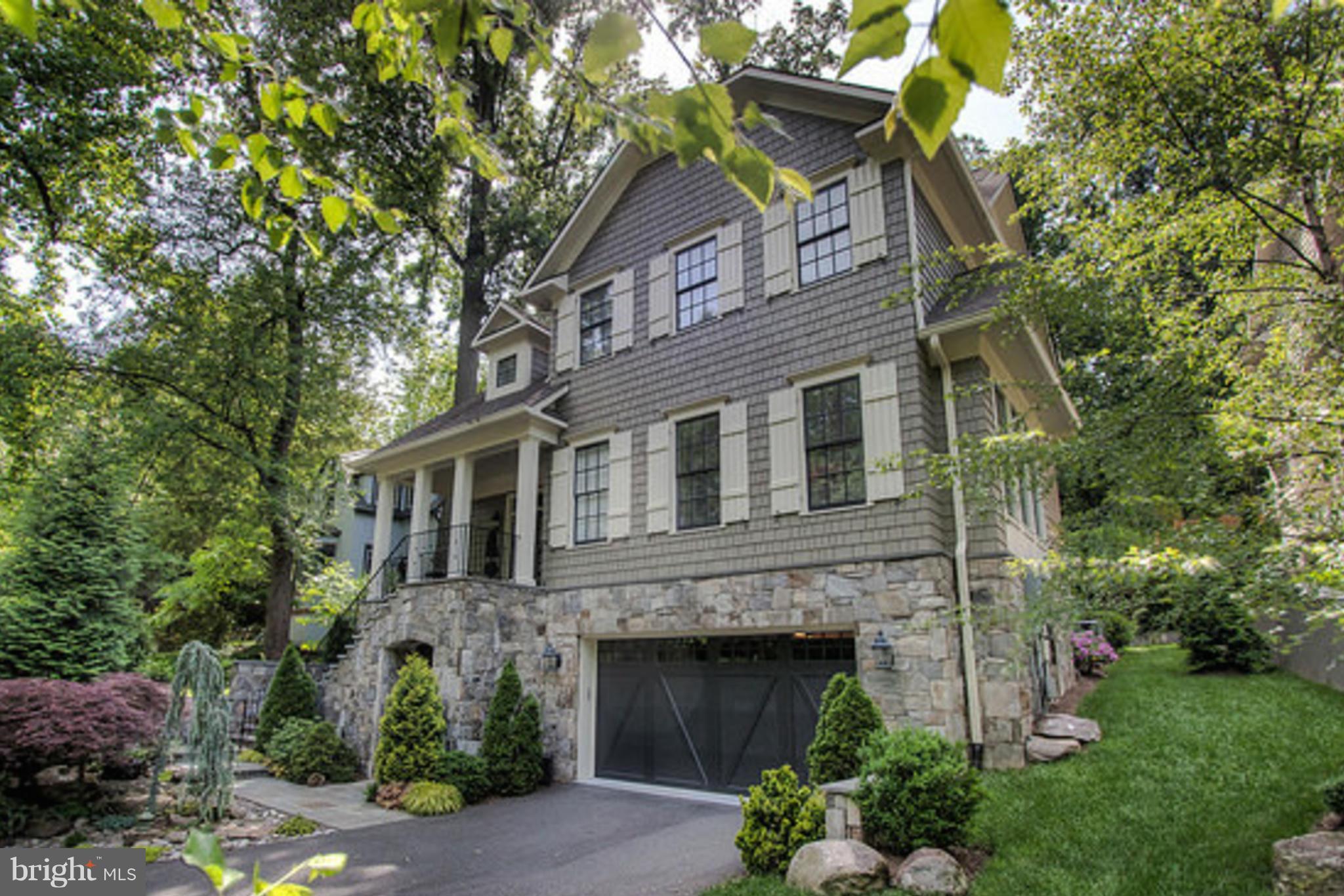 Tranquil magnificence & refined elegance await you at this craftsman estate.  With more than 6,300 sqft. on 4elevator serviced levels, no fine detail has been left to the imagination.  Savor culinary bliss in the state-of-the art chef s kitchen, fireside leisure in the family room, and al-fresco entertaining beside the cascading waterfall on the rear grounds of the residence. Welcome home.