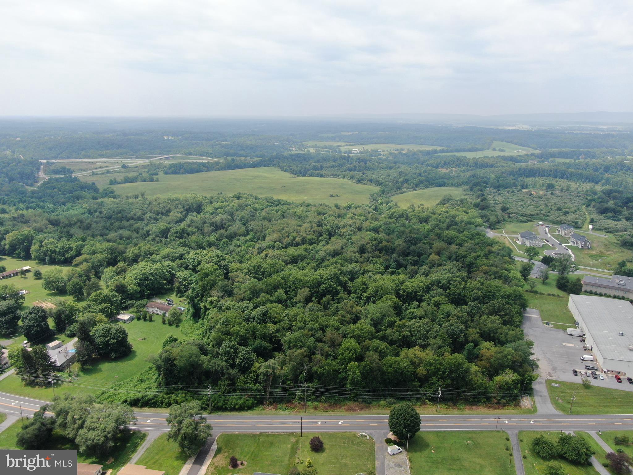 INCREDIBLE 5.85± ACRE PROPERTY IN KEARNEYSVILLE, WV! This exceptional property offers outstanding potential for a wide range of uses, including commercial development, residential development, a private estate, investment, recreation, and more. Ideally located, the property features approximately 650 feet of frontage on Charlestown Rd and offers excellent visibility in one of the area's fastest-growing locations. Conveniently situated just minutes from Rt. 9, approximately 6 miles from I-81, and only ½ mile from the Veterans Affairs Medical Center, this property provides easy access and strong surrounding demand. The property is surrounded by established businesses and expanding residential communities, with Sheetz, Quality Inn, Subway, self-storage facilities, and numerous other commercial businesses located nearby. Several residential developments are located directly across the road, further adding to the property's potential. Public water and sewer are available to the property. Whether you're looking to develop, invest, or build, this is a rare opportunity to own a prime piece of real estate in a high-growth area with outstanding potential.

Buyers are responsible for conducting all due diligence regarding potential uses, development requirements, permitting, utilities, and any other intended use of the property.

This property will be offered at sealed bid auction on Thursday, September 17, 2026, with bids being due by 1:00 PM. The sealed bid form will be available in the property information packet. The List price in no way represents a minimum, starting, or acceptable bid.

This property will be offered in a multi-parcel auction, providing buyers the flexibility to purchase Tract 1, Tract 2, Tract 3, any combination of the tracts, or all three tracts together as a whole. Tract 1: 43.5+/- Acres w/ frontage on Short Rd and Id Van Metre Rd, Tract 2: 5.85+/- Acres w/ frontage on Charles Town Rd, Tract 3: 2+/- Acres w/ frontage on Id Van Metre Rd.