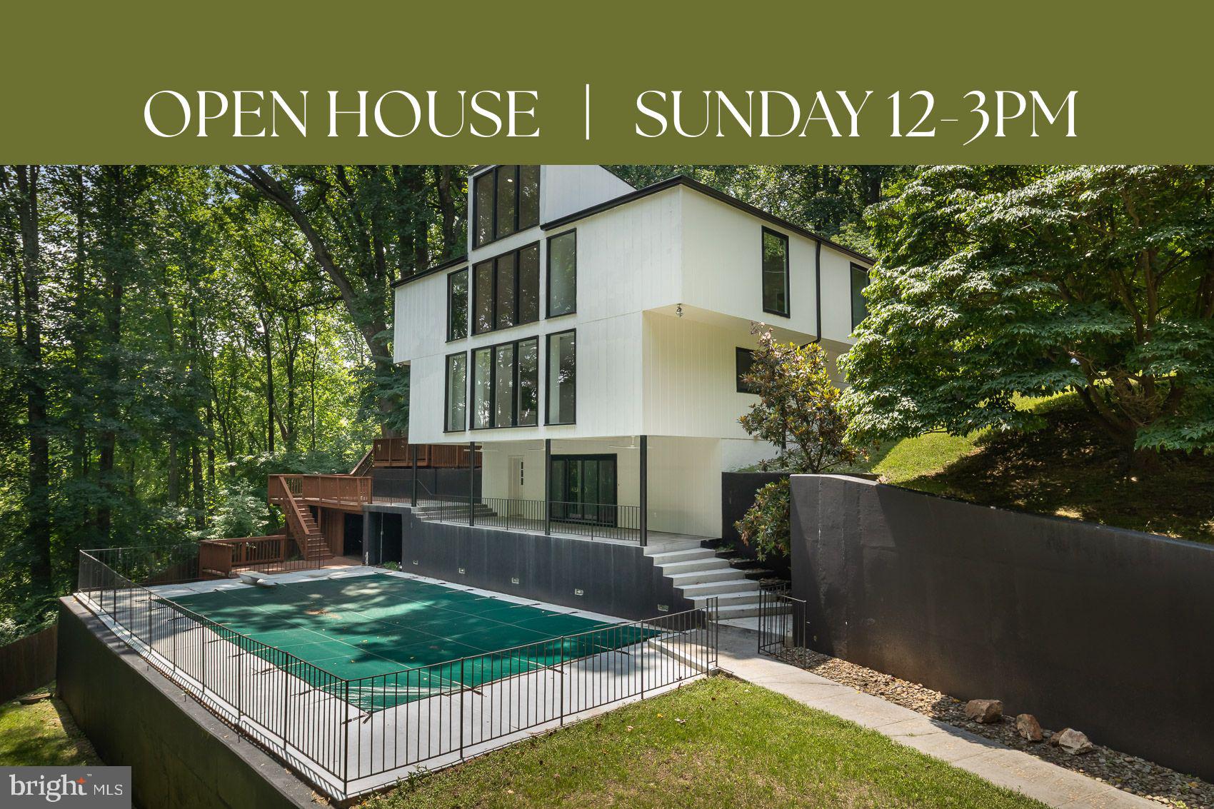 Step into a world of refined contemporary design. The GATED DRIVEWAY leads to this fully renovated 7,800-square-foot architectural home featuring 7 bedrooms and 9 bathrooms, nestled among the trees. Dramatic vaulted ceilings and expansive floor-to-ceiling windows flood the interior with natural light while framing serene woodland views, creating a seamless connection between the home and its natural surroundings.

Warm hardwood and natural stone flooring introduce rich, earthy textures throughout the open living spaces, complemented by distinctive brick architectural elements that add character and depth. The home’s thoughtfully designed layout features two distinct wings—the east wing houses the dramatic two-story great room along with four bedrooms, while the west wing offers a private retreat with the primary suite and additional guest suite. The striking great room with balcony overlook creates an incredible sense of scale and serves as a centerpiece for both everyday living and entertaining.

Outside, multiple decks and terraces extend the living space into the landscape, offering ideal settings for gatherings, outdoor dining, or simply enjoying the peaceful wooded setting. Located just steps from the Baisman Run trailhead at Oregon Ridge Park, this home offers immediate access to miles of scenic hiking and nature trails. With its bold contemporary architecture, unique design features, and impressive scale, this home is perfectly suited for memorable entertaining and sophisticated modern living.