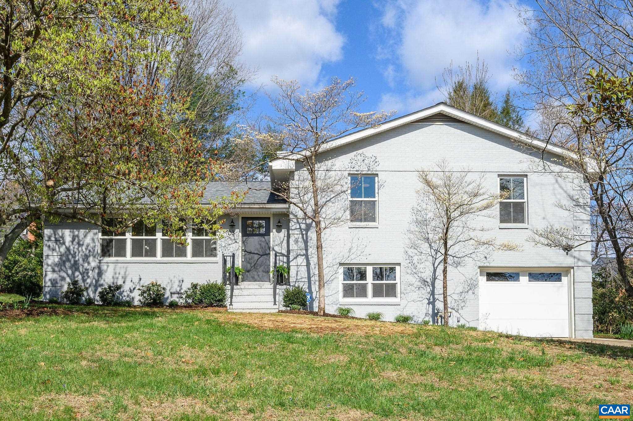This fully-renovated home combines location, lifestyle, and modern updates - in one of Charlottesville?s most desirable neighborhoods. This 4BR, 3BA split-level blends modern finishes with comfortable living spaces, all filled with natural light. The renovation included new roof, windows, appliances, doors, HVAC, water heater, plumbing, electric and more!   The main level has an open and inviting layout, perfect for everyday living and entertaining. The kitchen boasts a breakfast bar, stylish white cabinetry and new stainless appliances. Upstairs, the primary suite includes a spa-like bath and large walk-in closet. Two additional bedrooms and another full bath upstairs provide plenty of space for family and friends. The lower level includes a playroom/media area, a full bath and an additional bedroom (with separate entrance) which could also serve as a home office. A laundry area offers added convenience. Step outside to the patio to enjoy the level backyard?perfect for outdoor gatherings or play. There is also a 22Kw whole house generator.  Located just minutes from UVA, enjoy easy access to Barracks Road shopping, dining, and everyday conveniences, as well as Downtown and the scenic Rivanna Trail system. Listing agent is owner.,Quartz Counter,White Cabinets