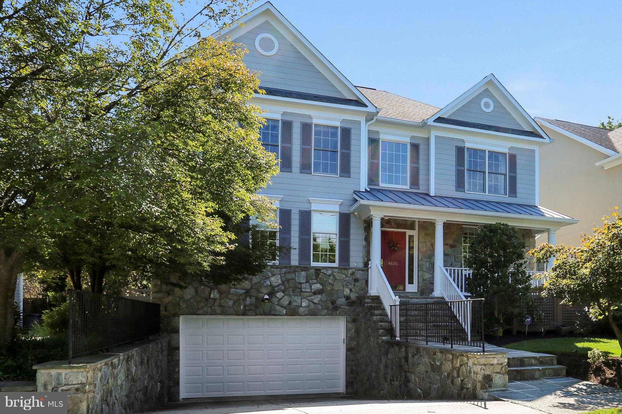 Lovely Arts and Crafts home featuring 2-story foyer, formal LR & DR, Library, Chef's Kit. open to Family Room and fireplace. Custom built-ins throughout, lower level rec.room, Bedroom and storage. Master BR suite with double vanities separate whirlpool & shower, guest BR w/ ensuite bath plus 2 additional BR's and hall BA. Landscaped multi-level flagstone patio and 2 car garage.