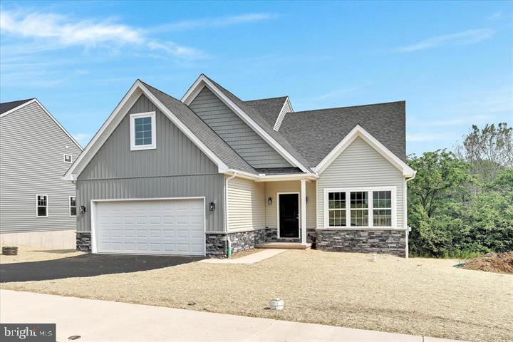 * No Open House Sunday 5/24 for Memorial Day Weekend*  Custom Main Floor Living in Lancaster County! Ideally located near the southern end of Lancaster, just minutes to Lancaster City and Millersville, this beautiful new construction home offers the perfect blend of convenience and privacy. The Newport model by Hunter Creek Builders, a trusted local Lancaster builder, features a thoughtfully designed layout with a main-floor primary suite and three spacious bedrooms upstairs, offering flexibility for family, guests, or a home office. Step inside to a welcoming foyer with soaring vaulted ceilings and a bright, open-concept floor plan filled with tons of natural light. The flowing layout creates an inviting atmosphere that’s perfect for both everyday living and entertaining. Upgrades include luxury vinyl plank flooring, a large kitchen island, upgraded cabinetry and vanities, 9-foot ceilings on the main floor, a full basement, and a two-car garage. Enjoy your private backyard backing to open HOA common area, offering peaceful views of nature and added privacy — the perfect setting for relaxing or hosting friends and family. Personalize every detail with Hunter Creek Builders’ streamlined “Customize Your Home” selection system, designed to make the building process smooth, simple, and enjoyable. Move in just in time to enjoy your beautiful new backyard. Call today to schedule your builder meeting!