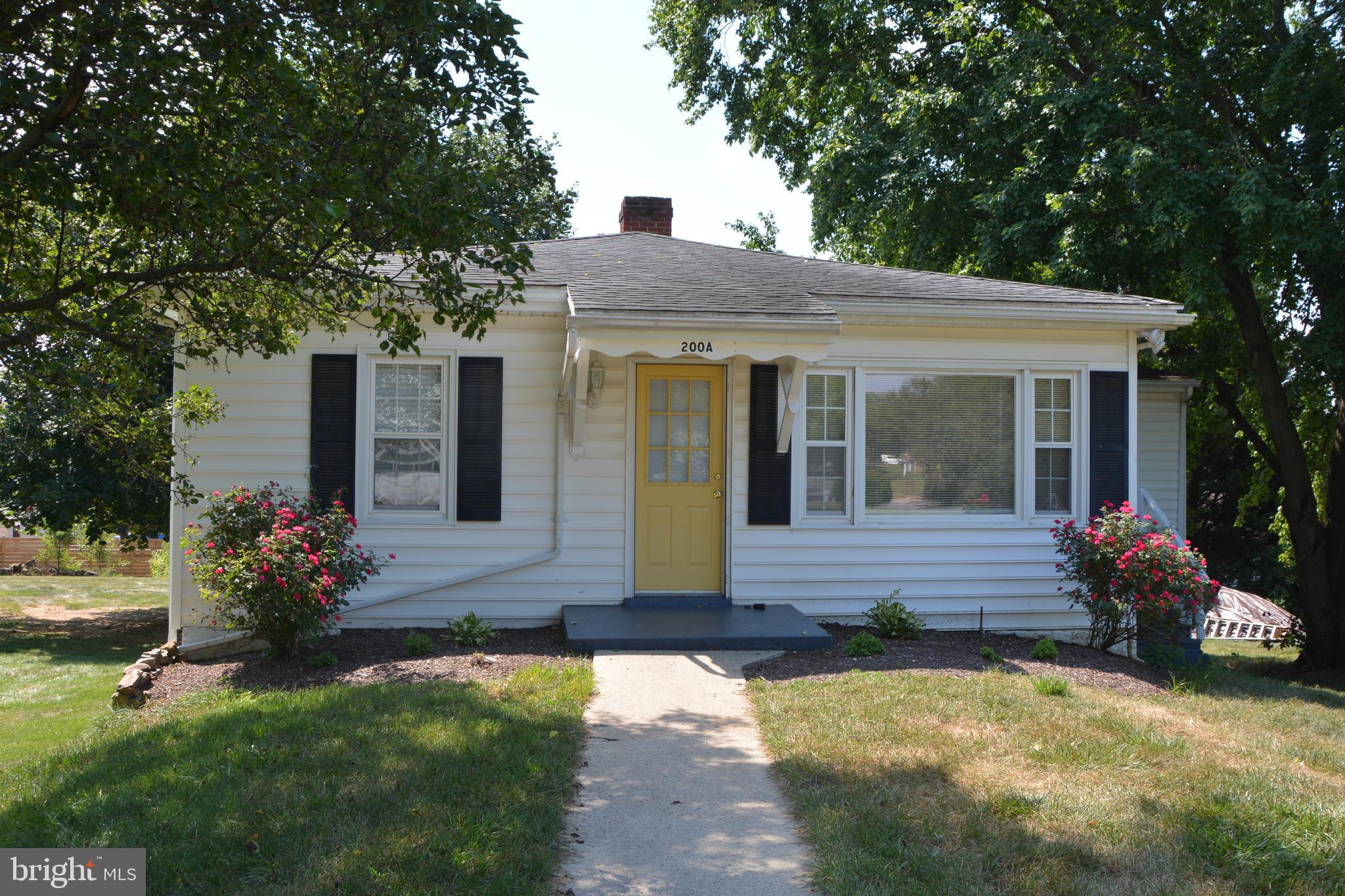 Large  basement apartment in beautiful neighborhood.  Utilities included in price.  This apartment has a nice size kitchen and living room. The floors are a charmingly unique tortoise shell ceramic tile throughout.  Enjoy the peace and quiet in this amazing space. Laundry room with washer and dryer. NO PETS ALLOWED
