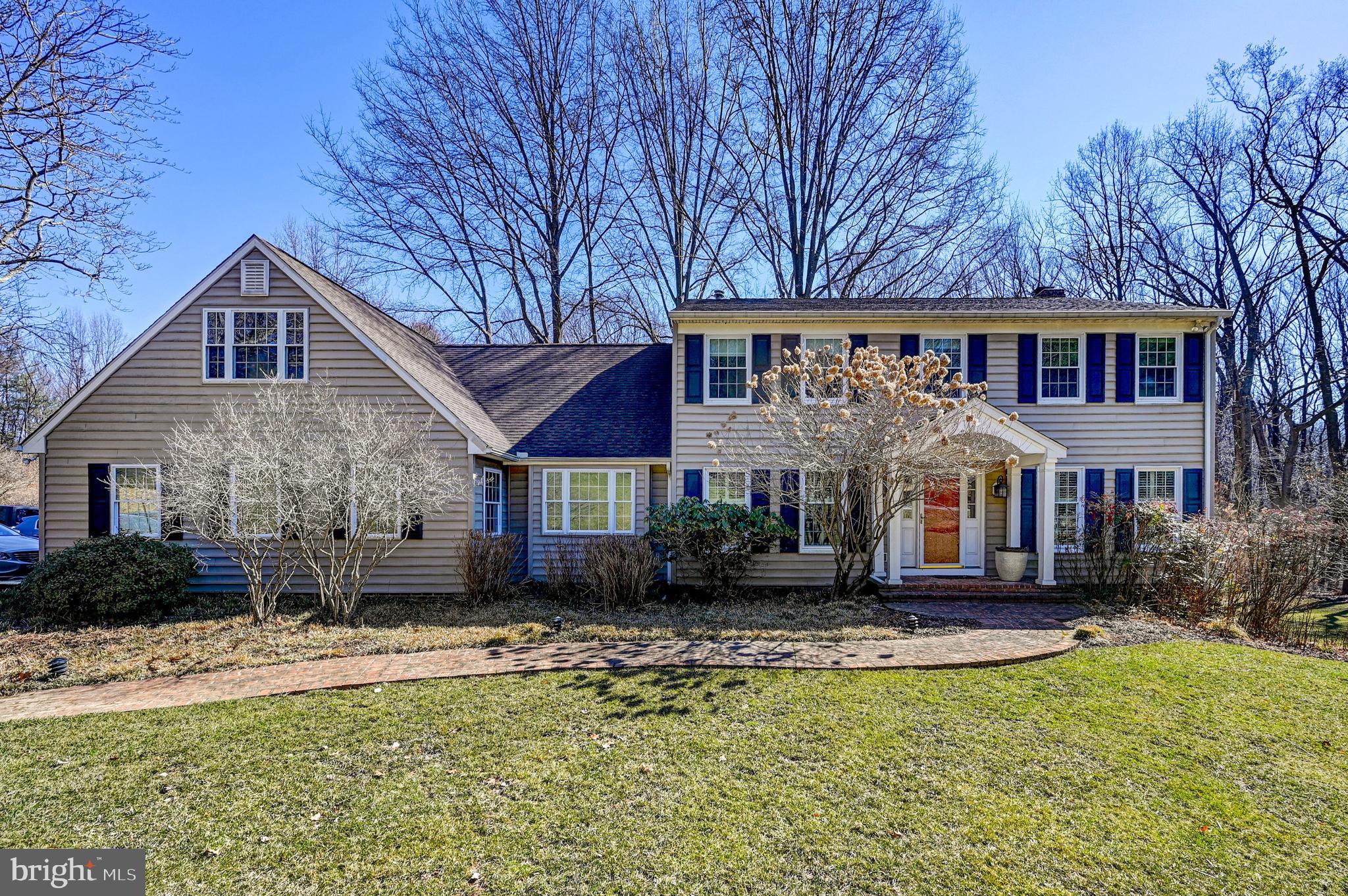 Welcome to timeless elegance in the heart of the coveted Falls Road Corridor.  Nestled on a tranquil cul-de-sac with access to Oregon Ridge Park, this magnificent, and pristine architecturally expanded four bedroom, three full and one half bath center hall Colonial sits on a beautifully landscaped and private 2-acre lot on picturesque Dellwood Court.  Perfection shines throughout, starting with the gleaming hardwood floors on both the main and upper levels. The inviting floor plan is thoughtfully designed for both everyday comfort and effortless entertaining. The heart of the home is truly the expansive chef’s kitchen; complete with high-end appliances, gas cooking, double ovens, a warming drawer, spacious island and breakfast bar.  This gourmet space seamlessly flows into a sunlit breakfast room and cozy family room featuring a wood-burning fireplace flanked by custom built-ins and French doors leading to the formal living room. The main level also offers a formal dining room, a spacious mudroom, a dedicated laundry room, and a versatile home office or bonus room.  The upstairs features four generously sized bedrooms including the primary suite with dressing area and en-suite bath.  A brand new spacious full bath is just down the hall along with the fourth oversized bedroom that includes a separate sitting area, offering flexible space for guests or extended family.  The finished lower level features new luxury vinyl plank flooring, a large recreation area perfectly prepped for a wood stove, a third full bath, utility room, cedar closet, and ample storage space.  Step outside from the main floor to enjoy the expansive composite deck overlooking the serene gardens, and a brick patio from the walk out lower level. Both offer an idyllic setting for outdoor entertaining or peaceful mornings surrounded by nature. Additional features include a three-car garage and an additional storage space for lawn tools and furniture.  This exceptional home truly offers the best of both privacy and convenience in one of Baltimore County’s most desirable locations.