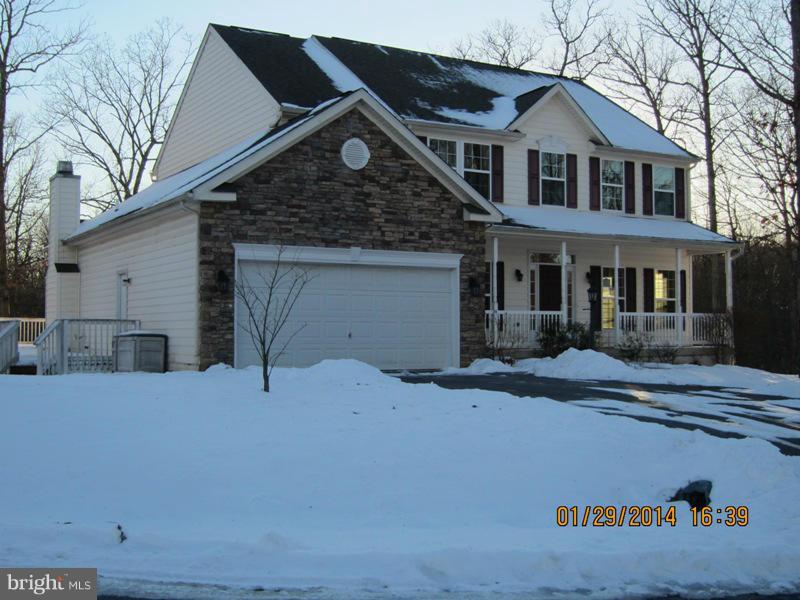 Nice home on wooded lot with walls and ceilings repainted. Hardwood flooring in great condition.  Large deck , big sun room, 2 A/C units and 2 water heaters.You must see this big home.  Seller willing to pay up to $500.00 for buyers Home Warranty Policy. EMD to listing company.  Open doc section for more information.