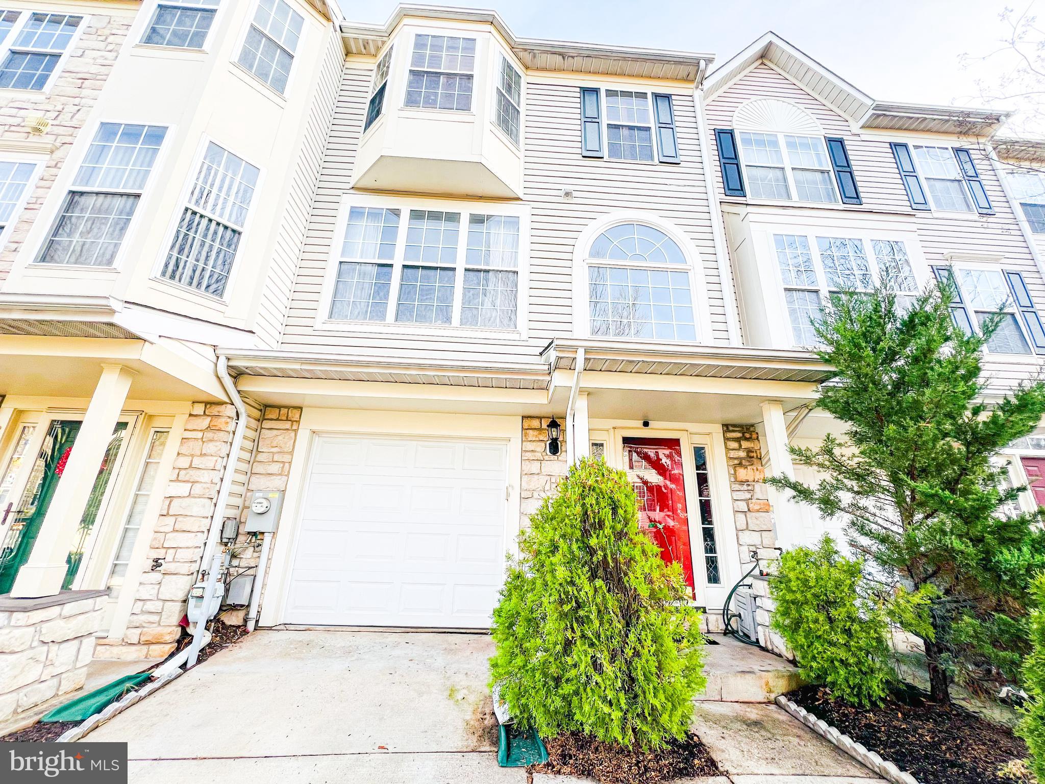 This three-level townhouse, featuring a stately two-story foyer, a one-car garage, deck and  of an in-unit washer and dryer. The residence offers two full baths and  half baths, ensuring a perfect blend of comfort and style. Nestled in the desirable Russett community, with close proximity to Target and various shops, it caters to both practicality and lifestyle. Positioned off the parkway between Baltimore and DC, this townhouse not only defines modern living but also offers a commuter's dream location. Don't miss the chance to experience this exceptional property at the open house on Saturday and Sunday – where every detail contributes to a life of ease and sophistication.