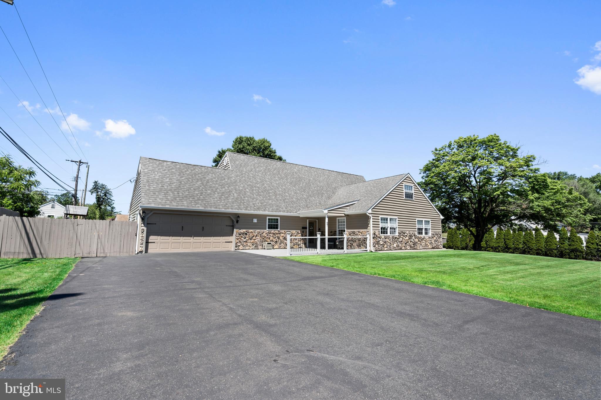 Welcome to 57 Rust Hill Road, an exceptional custom home nestled on a beautifully landscaped .38-acre lot in the highly desirable Neshaminy School District. Offering 6 bedrooms, 3 full baths, and 2,456 square feet of thoughtfully designed living space, this home perfectly blends timeless elegance with modern comfort. Step inside to a stunning  foyer featuring custom millwork, wainscoting, and a beautiful hardwood staircase that sets the tone for the rest of the home. The spacious living and dining areas flow effortlessly into the heart of the home—a beautifully updated kitchen complete with granite countertops, abundant cabinetry, stylish tile backsplash, stainless steel appliances, and a center island perfect for gathering.  The flexible floor plan includes a first-floor primary suite with a private bath, while the second level offers generously sized bedrooms, updated bathrooms, and an expansive bonus room ideal for a playroom, office,  media room, or additional family space. An additional highlight to the property are the picture frame windows and  crown molding throughout. A walk-up attic provides exceptional storage and endless possibilities. Step outside to enjoy the covered rear patio overlooking an impressive, fully fenced backyard with plenty of room for entertaining, outdoor games, or simply relaxing in your own private oasis. The oversized driveway and attached garage provide ample parking and storage. Neutral décor, recessed lighting, crown molding, updated finishes, and meticulous pride of ownership make this move-in ready home a rare find in Middletown Township. Home also features 200 amp service, an oversized 4.5 ton central air system installed in 2019. This is the one you’ve been waiting for!
House was rebuilt in 2007 due to a fire.
Previous appraisal has the square footage listed as 2876.
