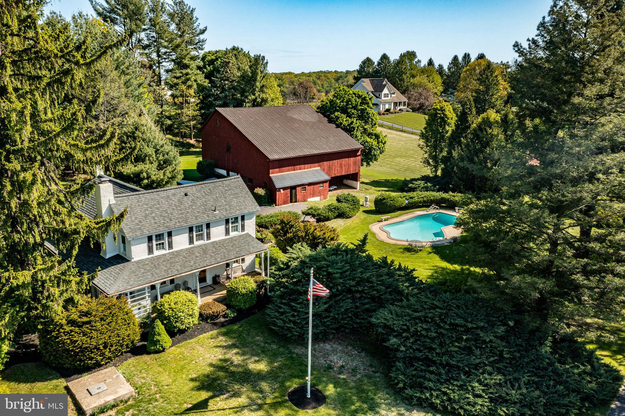 Welcome to 455 Dilworth Rd — a charming farmhouse-style property full of character, space, and opportunity! Situated on a beautiful lot with scenic countryside views, this 4-bedroom home offers the perfect blend of classic charm and functional living with spacious living and dining areas, hardwood flooring, a large country kitchen with ample cabinet space, generously sized bedrooms, and an updated full bathroom. The enclosed porch provides the perfect place to relax and enjoy peaceful mornings overlooking the property. Outside is where this property truly shines, featuring a large barn with horse stalls, workshop space, and endless potential for hobbyists, car enthusiasts, small business owners, or anyone looking for extra storage and usable space. The expansive driveway, mature landscaping, and open yard create a private country feel while still being conveniently located in the highly sought-after Downingtown Area School District, home to the award-winning STEM Academy, and directly next to East Brandywine Township Park for easy access to walking trails, sports fields, playgrounds, and outdoor recreation. Whether you're looking for a homestead, hobby farm, or simply a unique property with room to grow, 455 Dilworth Rd is packed with possibilities!