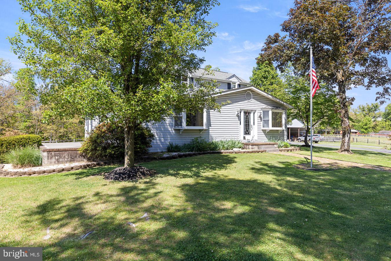 Country home just outside of Front Royal with a peaceful farm setting! This 3-bedroom, 2 full-bath home sits on over 9.5 acres and is ready for country living. The property includes a 2-stall barn, 2-car garage, and storage shed, with fenced areas suitable for goats, cows, sheep, geese, chickens, and more. Check with the county regarding horse permits.  Inside, you’ll find newer LVP flooring throughout, with carpet in the main-level bedroom. Recent updates include a newer pressure tank and dishwasher. The home features laminated countertops, stainless steel appliances, and a whole-house water softener system.  Additional highlights include a wet and dry lot, a roof less than 10 years old, and a barn roof approximately 17 years old. Propane is leased, and the septic tank was pumped in 2025. The HVAC system is older but has been professionally maintained annually and remains in excellent condition.  The original house was built in 1933.