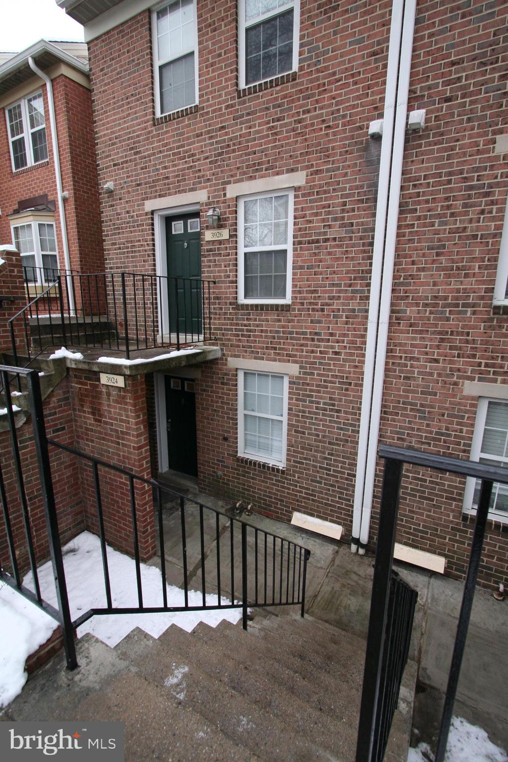 Updated townhouse!  Newly renovated.  Two Bedrooms on first level with gorgeously updated Full Bath.
Lower Level boasts a Kitchen with Stainless Steel Appliances - Refrigerator with water and ice through door, Gas Range with microwave over Range and Dishwasher.  Plenty of Cabinet Space.  Half Bath off Kitchen. The Laundry Room has a stacked washer and dryer as well as counter and cabinet space - off the kitchen as well.
The Dining Room has a pass-through to the Kitchen.  There is a china cabinet that will stay in the Dining Room.  The Living Room is a large 15 x 12 area that has a super TV that will stay with the property.  Level walk-out to the back patio.
