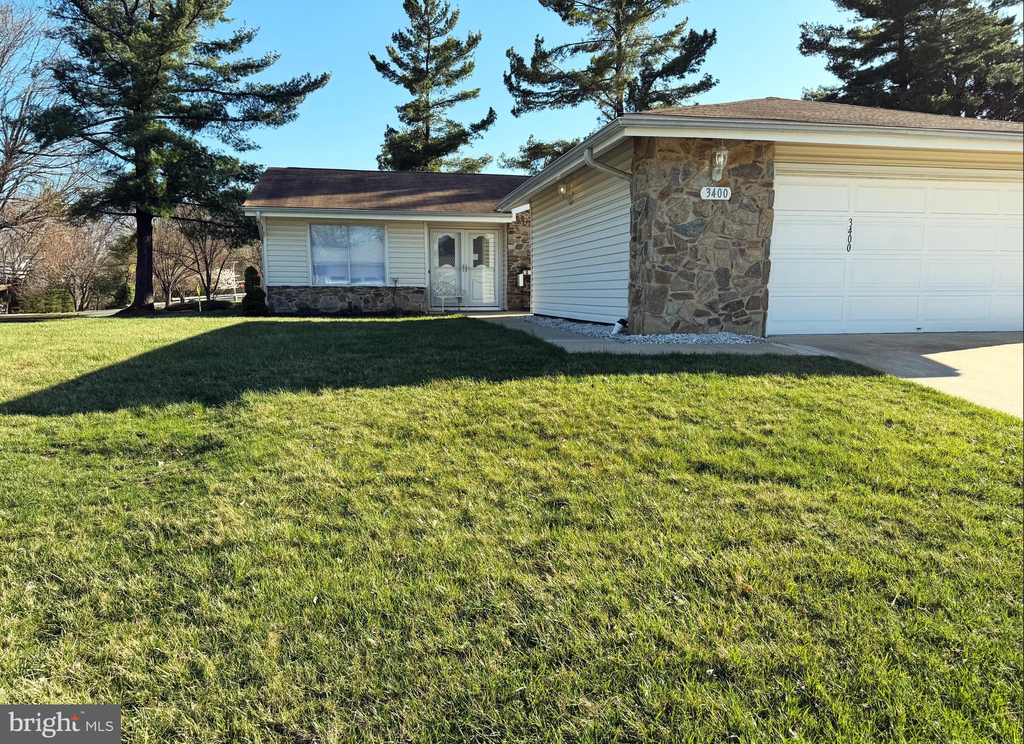 Back up Offers are Welcome. Leisure World's rare offering of an upgraded Barstow model patio home, on a corner lot of cul-de-sac, stone/siding semi-detached, shaded, all new landscaping surrounding this exquisite lot. Mutual 16, is regarded as a highly sought after community boasts a 3 bedroom, 2 full bath, one floor spacious living and patio area and a 2 car garage is perfect for vehicles and storage. The sunroom/sliding glass door patio, carpeted, high quality ceiling fan with views to common areas, trees and Clubhouse 2.  
This home invites versatile living, entertaining options with a semi open kitchen of all new: lighting, appliances, dramatic, tall, shaker, white cabinetry complete with soft closing, rev-a-shelf ease, high premium white/black heat, scratch resistant, granite countertops. 
The living room, dining/sun/breakfast room flow with natural light. Throughout the house is new luxury vinyl, all new lighting, Sherwin Williams Emerald grade, fresh paint, a brand new kitchen offers the perfect space overlooking the sun/breakfast room.  The primary owner's suite, the two additional bedrooms all offer expansive lighted with dimmers, closet space with optimal organizers and upgraded baths.  The laundry room is highly accessible.  The condo fee includes all electric and water and offers so many amenities, recreations facilities, lawn care, cable, internet! Enjoy the gatherings, golf course, clubs, fitness centers, pools, shows, club house restaurant, medical care center and many other opportunities to be as active as you want in everyday activities offered at Leisure World.