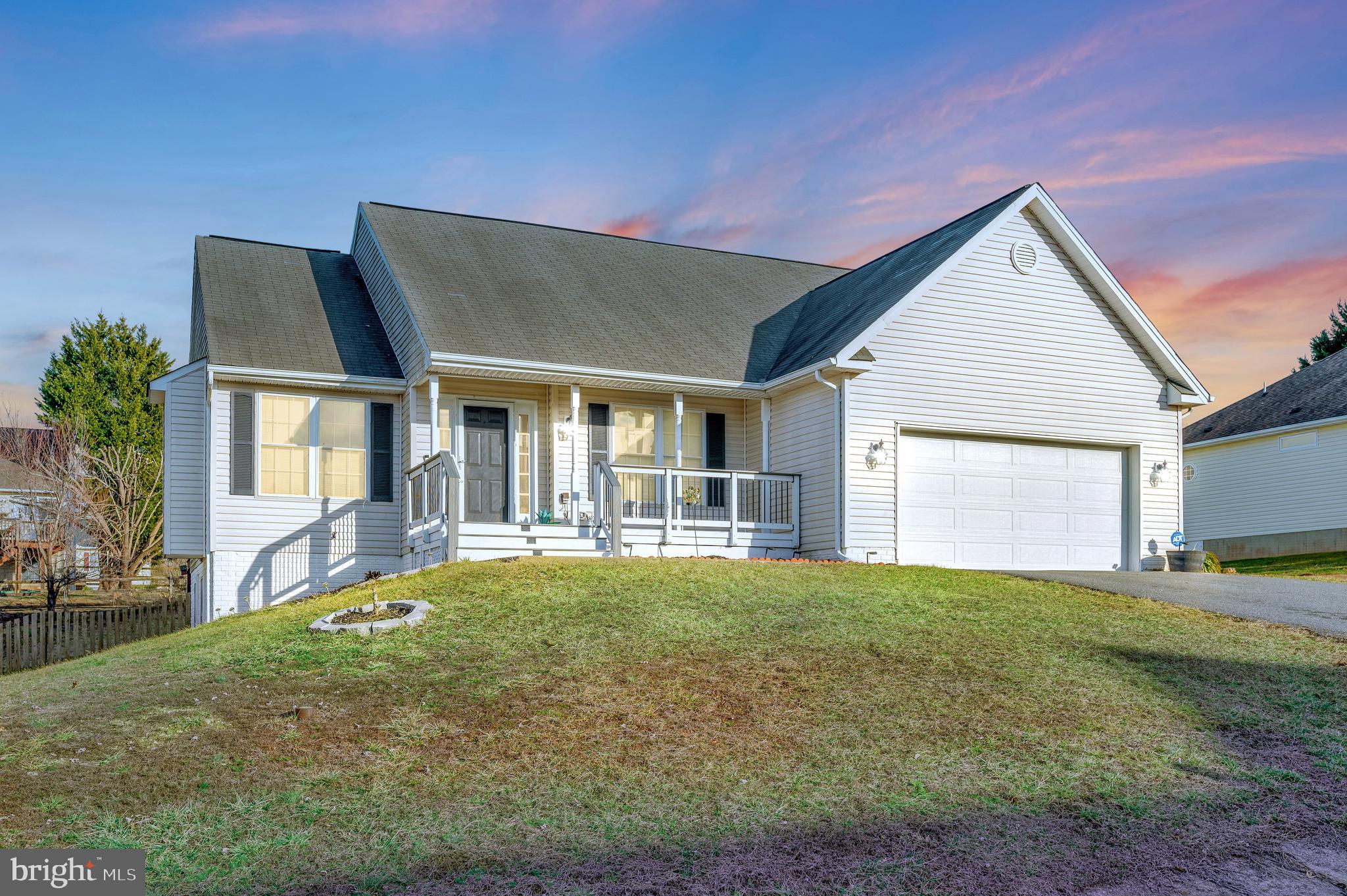 Welcome to this gorgeous 4-bedroom, 2-bathroom home in the highly sought-after Grande Staff North at Lee Hill! This rambler-style home features a fully finished walkout basement and over 2,800 sq. ft. of living space, packed with modern updates throughout. Step inside to find an inviting open floor plan with luxury vinyl plank flooring in the kitchen, living room, and bathrooms, soaring vaulted ceilings, and a cozy gas fireplace. The chef’s kitchen shines with freshly painted white cabinetry, quartz countertops, a custom backsplash, and stainless steel appliances. The main level features two spacious bedrooms, including the primary suite, which offers a walk-in closet and a spa-like bath with his & her sinks, a huge soaking tub, and a separate stand-up shower. A second full bathroom is also located on this level for added convenience. Downstairs, the finished walkout basement includes two additional bedrooms, a large recreation room, and new carpet throughout, plus freshly painted hallways and basement walls, creating a bright, updated space. Plenty of storage is also available. Enjoy the newly added front porch, perfect for relaxing and soaking in the peaceful surroundings of this wonderful neighborhood. Sought after community of Lee's Hill includes wonderful amenities to includes pools, tot lots, playgrounds, walking trails, clubhouse and more! Conveniently located near shopping, dining, downtown Fredericksburg and major commuter routes including VRE, this home is move-in ready and waiting for you!!