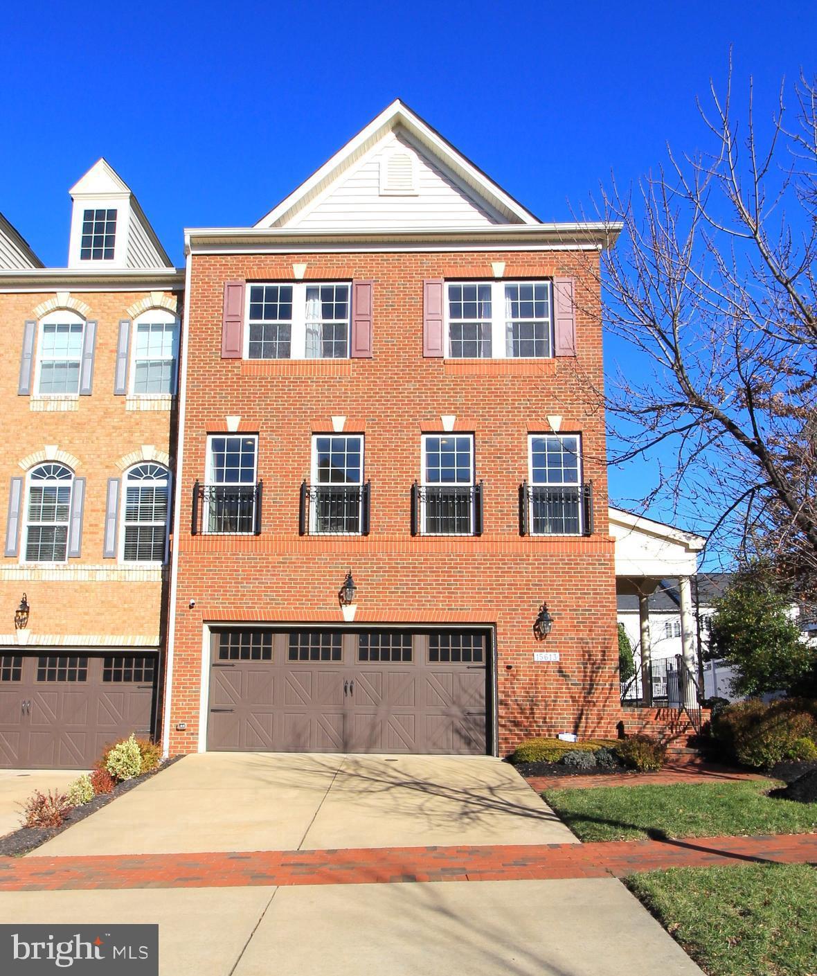 Come cozy up in your new home at 15613 Burford Lane in amenity rich Beechtree. This stunning brick end-unit townhome boasts 3 bedrooms and 3.5 bathrooms, offering ample space for you and your loved ones to spread out and thrive. The upgrades set it apart. You enter through your private side entrance and find a welcoming lower-level foyer that leads up to the expansive main level. Here you’ll feel at home in your generously sized space, that’s an entertainer’s dream. The warmth of the natural light is an added bonus of living in an end unit. This level features an open living room and dining area, perfect for hosting dinner parties or sharing family meals. The kitchen is a chef's dream, equipped with stainless appliances, a large island, and a breakfast bar made for serving your guests. With a butler’s pantry and a walk-in pantry, it’ll be hard to run out of storage space. Your dinner parties can spill out on the private deck at the rear of the kitchen. Also, take note of the custom light fixtures on this level. 
The upper level features a spacious primary suite with a large walk-in closet and an en suite bathroom. This level is rounded out with two other bedrooms, a shared bathroom and the laundry closet. The basement offers a relaxing, well-lit entertainment space, a full bathroom and a rear slider that leads to your private, fenced rear yard.  To round it off, this townhome has a large 2-car garage and a sprinkler system in the yard. Community amenities include its recently updated clubhouse, to its massive swimming pool to the many outdoor recreation options of golf, tennis, soccer fields, walking paths, and tot lots/playgrounds. This home exudes taste and has been upgraded very nicely. This is your hard-to-find oasis. This rare opportunity awaits your purchase.