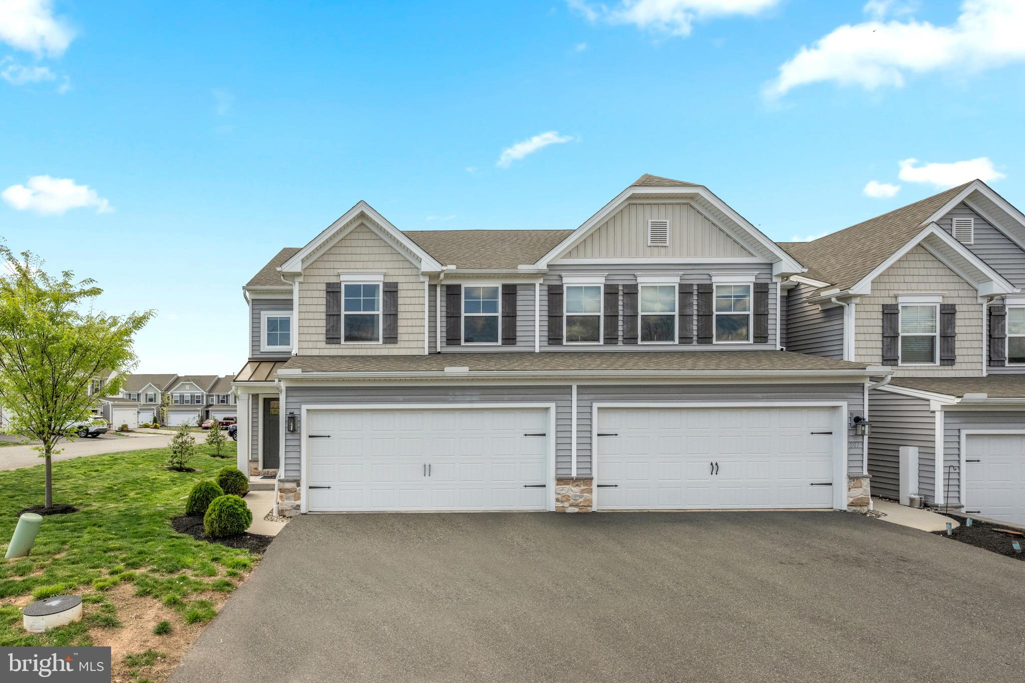 Welcome home to this like-new, end-of-unit townhome in the desirable Rolling Meadows community. Built in 2021, this modern 3-bedroom, 3.5-bath residence offers approximately 2,347 sq ft of finished living space on a low-maintenance lot. The end-unit location provides extra privacy, natural light on the side, and added yard space.
The exterior features beautiful curb appeal with fresh beige siding, stone accents, a welcoming covered entry, and a two-car attached garage with ample driveway parking. Manicured landscaping and a bright, open setting make this home stand out.
Step inside to an open-concept main floor perfect for modern living. The gourmet kitchen is a showstopper with a large center island (seating for four), white shaker-style cabinetry, sleek gray countertops, stainless steel appliances (including a French-door refrigerator), and elegant black pendant lights. It seamlessly connects to the living and dining areas—ideal for everyday living and entertaining.
Upstairs you’ll find three spacious bedrooms, including a private primary suite with its own full bath, plus a second full bathroom and a convenient powder room on the main level.
The full basement (approx. 550 sq ft) is a standout feature that also has its own full bathroom and is already equipped with a premium Lutron Lighting System that includes motorized blinds. This smart setup offers exceptional convenience, energy efficiency, and ambiance—perfect for a home gym, playroom, media room, home office, or future finished living space.