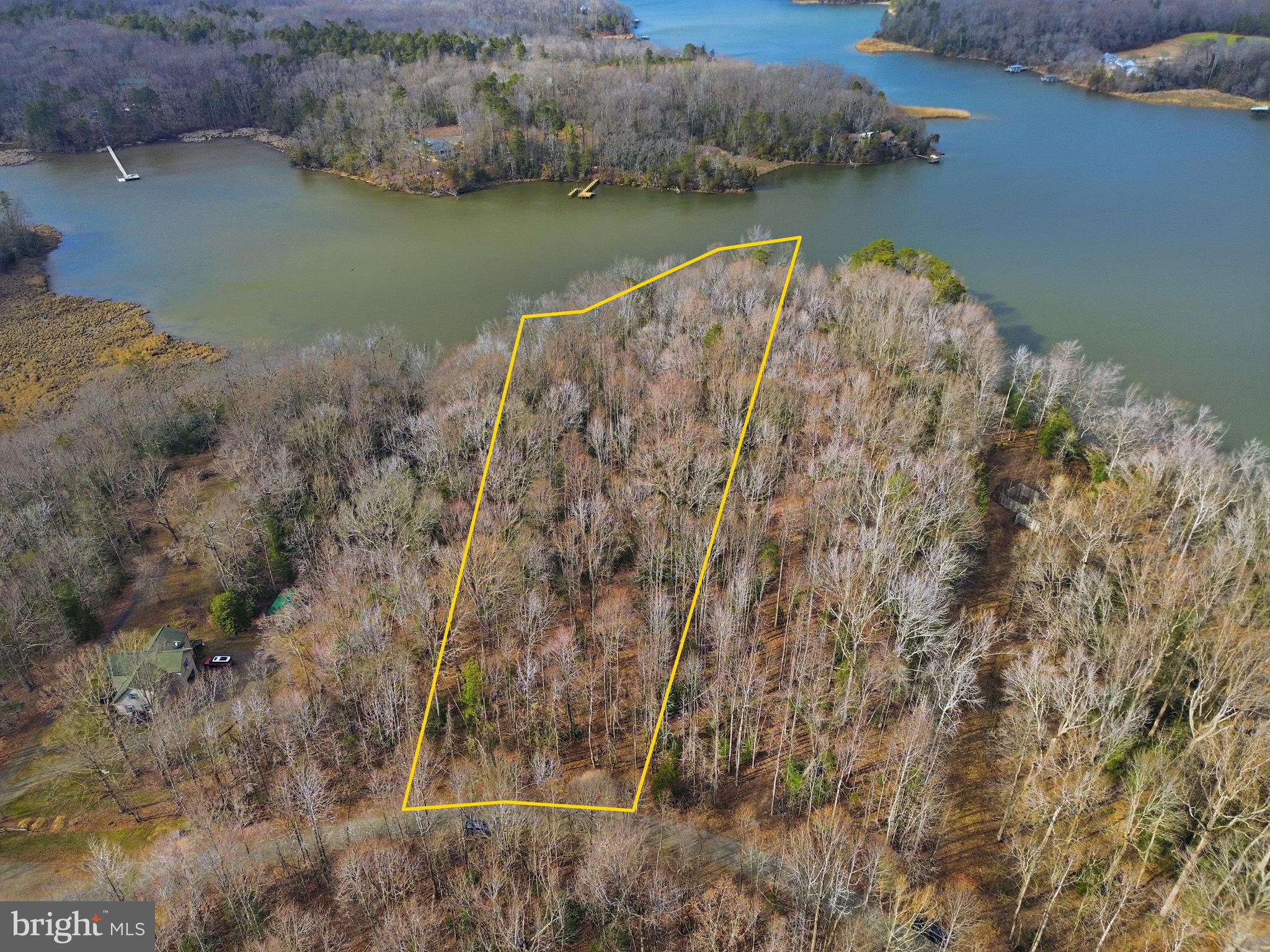 Public Remarks: Located in the quiet and scenic Old Prospect Landing subdivision in Montross, Virginia, Lot 18 is a premier building site spanning 2.43 acres. This wooded parcel offers a rare combination of privacy and deep-water access, boasting an impressive 5+ feet of Mean Low Water (MLW) at the shoreline on Nomini Creek. Such depth makes it ideal for boating enthusiasts with larger vessels or those looking to construct a private dock with reliable water access throughout the tides. The lot's natural, sloping topography is well-suited for a custom home with a walk-out basement, potentially providing elevated views of the water with selective clearing. Residents here also benefit from the community’s shared amenities, including a boat ramp and fishing pier, while enjoying the convenience of community water provided by Virginia American Water. The Montross area offers a blend of significant American history, scenic outdoor recreation along the Potomac River, and a welcoming local dining scene. You can spend your mornings hunting for ancient shark teeth at Westmoreland State Park or walking the historic grounds of Stratford Hall and the George Washington Birthplace National Monument, both of which provide a serene look into the region's colonial past. For those who enjoy the outdoors, the local creeks and the Potomac River are perfect for boating, crabbing, and fishing. After a day of exploring, the local dining scene provides a warm, small-town atmosphere; you can grab a creative caffeine fix at the Art of Coffee, enjoy a craft pint in the beer garden at Northern Neck Brewing Company.