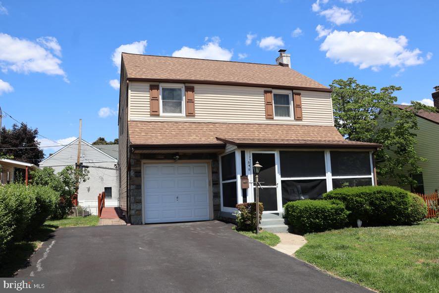 Welcome to this spacious 3-bedroom Colonial in Morton offering endless potential for homeowners and investors alike. Featuring an enclosed front porch, large living room with fireplace, formal dining area, attached one-car garage, private driveway, and a bonus room upstairs perfect for a home office or flex space. Owned by the same family since 2006, this home is ready for your personal updates and improvements. A recently replaced roof provides added peace of mind. Conveniently located on Amosland Road with Amosland Elementary School just down the street, plus easy access to shopping, parks, and major routes. A great opportunity to build equity and make this home your own!
