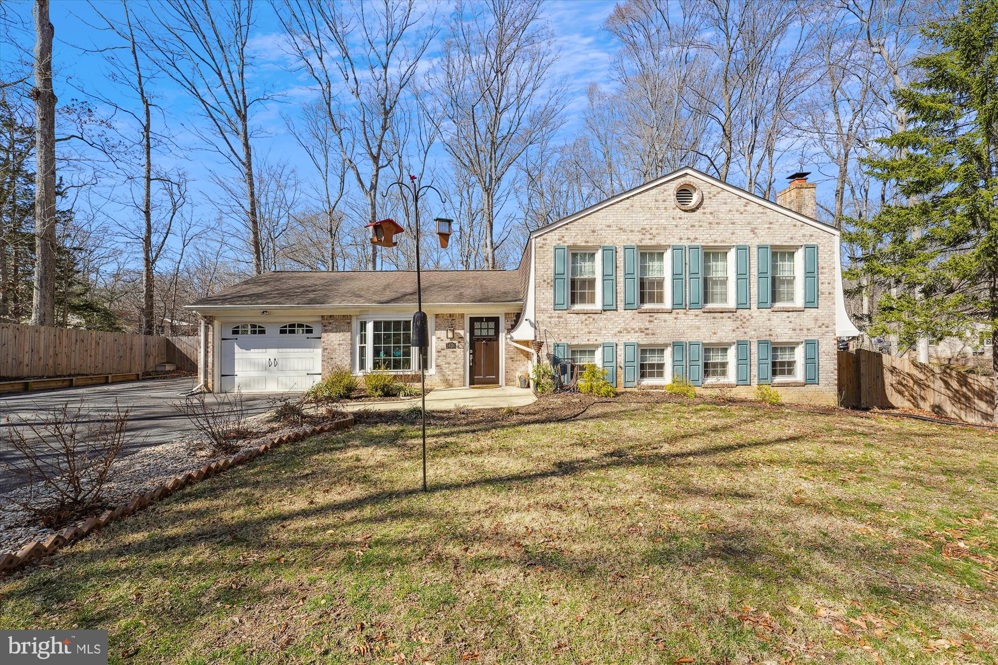 Welcome to this beautiful 5-bedroom, 2.5-bath split-level home, offering the perfect blend of elegance and functionality. The stunning kitchen is a chef’s dream, featuring upscale stainless steel appliances, a large island, and an open layout that overlooks the bright eating area and spacious living room with a cozy fireplace—ideal for entertaining.

As you enter, you're greeted by a magnificent slate foyer that adds a touch of sophistication. The main level includes the gorgeous kitchen, dining room, and living room, along with the primary bedroom, complete with an en-suite bath. Two additional bedrooms and a full hall bath round out the main floor.

For added privacy, there’s a separate bedroom or office located on its own level, perfect for a home office or guest suite. The lower level boasts a fourth bedroom, a half bath, a convenient laundry room, and a large storage area for all your needs.

Set on a generous 1.3-acre lot, the fully fenced backyard offers privacy and plenty of space for outdoor enjoyment. This home is truly a must-see—schedule your tour today!