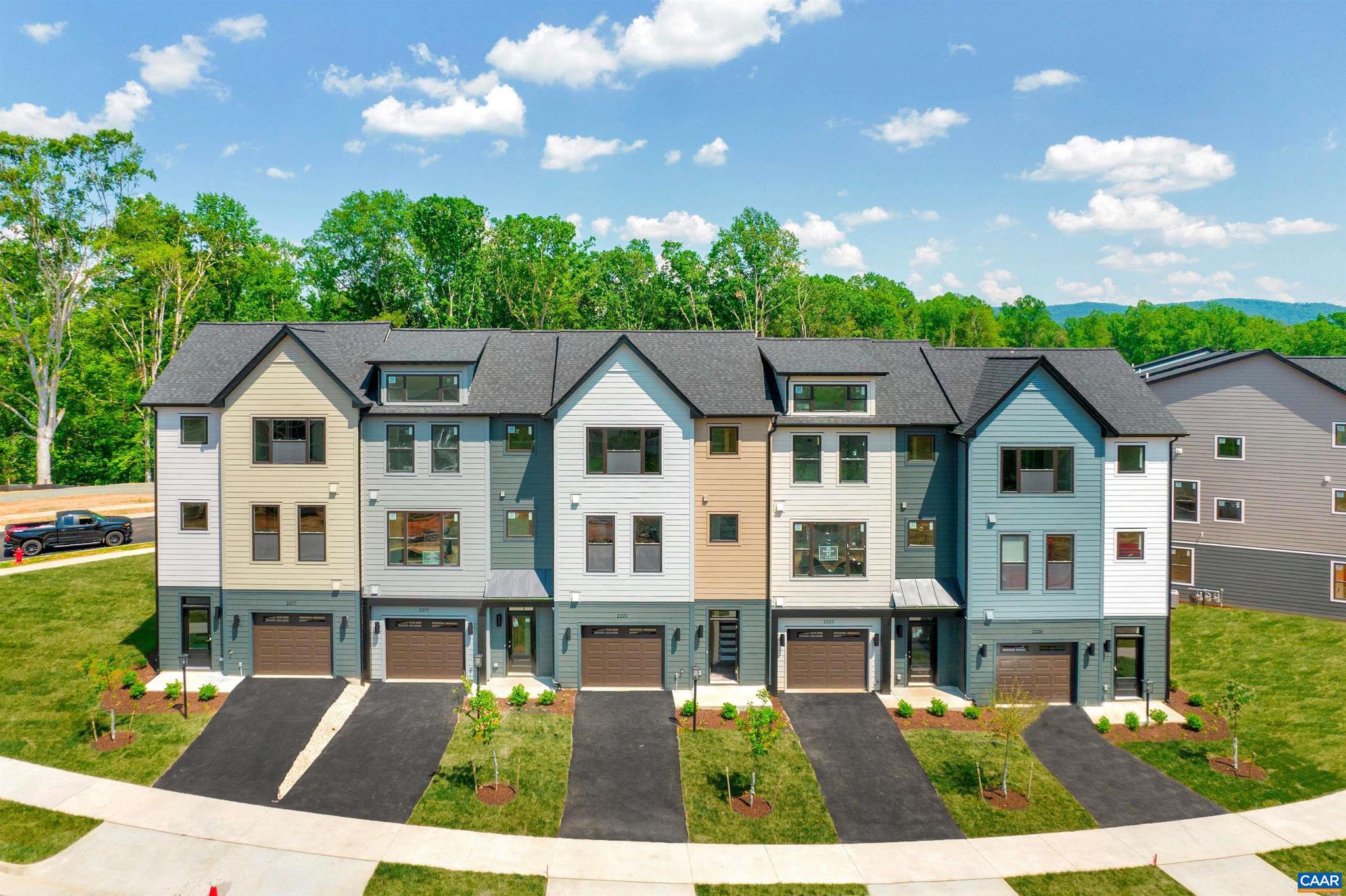 Selling for Spring 2023 delivery. To be built Bainbridge features 3 br, 3.5 ba, included flex room/office, & attached garage. Low Maintenance exteriors & lawncare included. END UNIT with a thoughtfully designed open floorplan includes a galley style kitchen, oversized 9' island, great room w/ fireplace, & 10 additional windows for an abundance of natural light. An oversized 8? X 20? COVERED TREX deck backs up to mature trees for relaxing evenings, morning coffee, and outdoor entertaining. ***Limited time left to make your own interior selections.***  Belvedere is an established community centrally located to all things C'ville, just 2 miles to the Downtown Mall & RT 29 shopping, 5 miles to UVA, yet in a peaceful setting surrounded by nature & the Rivanna Trail. LAWN CARE & TING FIBER internet included in HOA. All homes are 3rd party tested for energy efficiency & come w/ PEARL GOLD certification. Ask us about closing cost incentives. Similar Photos.,Granite Counter,Maple Cabinets