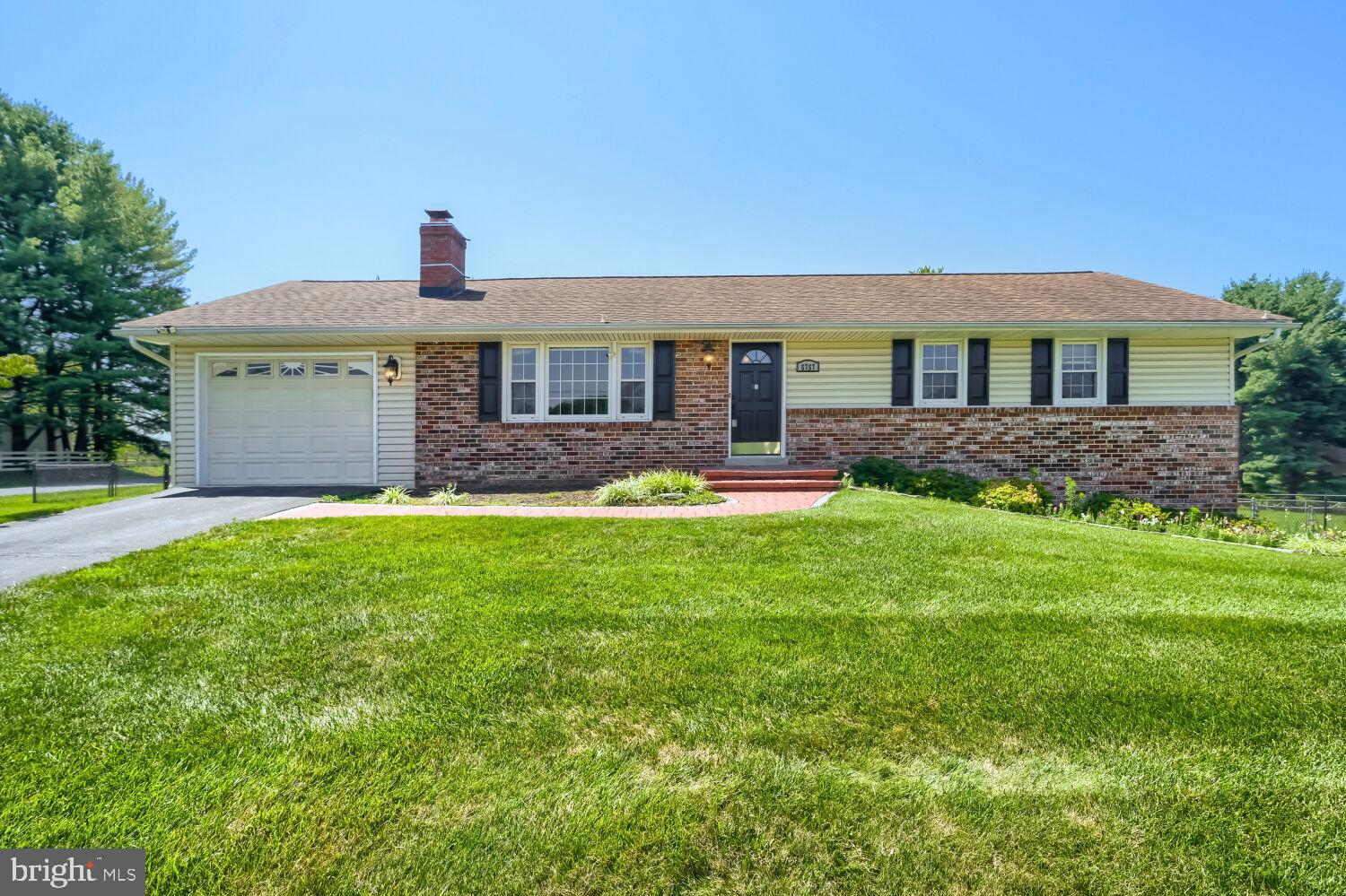 Pride of ownership shines throughout this lovingly maintained, family-owned rancher situated on a beautiful ½-acre level lot in the sought-after Linganore High School district.

Designed for comfortable one-level living, the main floor offers 3 bedrooms and 2 full bathrooms, including a spacious primary suite with its own private bath. Refinished hardwood floors span the living room, dining room, foyer, hallway, and all three bedrooms, creating a warm and timeless feel. The inviting living room features a wood-burning fireplace and custom built-in cabinetry, while additional custom built-ins add charm and functionality to the third bedroom.

The oversized attached garage provides exceptional depth for storage, hobbies, or a workshop, and the driveway easily accommodates 3–4 additional vehicles.

Step outside to enjoy the expansive ½-acre level backyard, offering endless possibilities for entertaining, gardening, outdoor recreation, or simply relaxing with family and friends.

The finished walkout lower level adds incredible flexibility with a spacious family room featuring a wet bar, making it an ideal space for entertaining or creating a comfortable in-law suite. This level also includes a full bathroom with a large walk-in shower and a finished bonus room that is perfect for guests, a home office, fitness room, or potential fourth bedroom (buyer to verify bedroom requirements). With both interior stairs and a private walkout entrance, the lower level offers excellent potential for multi-generational living. You'll also find a laundry room with utility sink, sump pump, and an unfinished area that's perfect for storage, a workshop, or future finishing.

Conveniently located within the Linganore High School district and just minutes from shopping, dining, parks, and commuter routes, this well-cared-for home offers the perfect combination of space, flexibility, and pride of ownership.