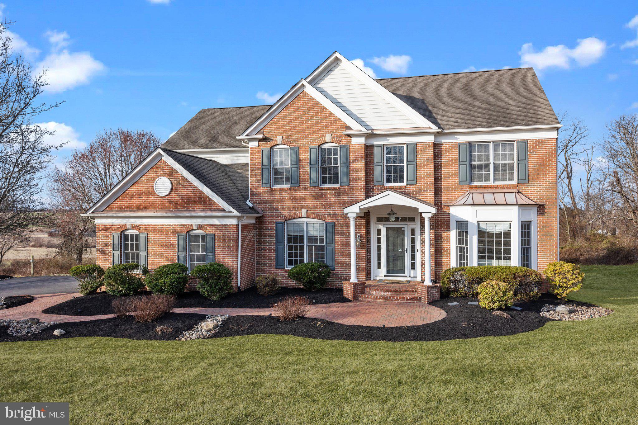 Welcome home to the one you've been waiting for! 106 Clover Rd is a beautifully updated 5-bedroom, 4.5-bath Center Hall Colonial located in the desirable Northampton Township within the Council Rock School District. Situated on one of the largest lots in the neighborhood, this property offers over 5,000 total square feet of living space across three stunning levels, providing ample room for your family’s needs.  Nestled on a quiet 1.51-acre lot, the home offers privacy and breathtaking views and vistas of rolling hills and Bucks County farmland. As you arrive, you'll be greeted by an inviting brick front facade, mature landscaping, long driveway, and a brick walkway leading to the front door.  Inside, the two-story foyer features hand-scraped wide-plank hardwood flooring, crown molding, and custom millwork. The impressive two-story family room boasts floor-to-ceiling windows framing a cozy gas fireplace and opens to the stunning kitchen.  The gourmet kitchen is a chef's dream, featuring center island, walk-in pantry, stainless steel appliances, tiled backsplash and recessed lighting. Hickory 42” cabinets provide ample storage, while gorgeous granite countertops extend to a built-in desk area and breakfast bar. Adjacent to the kitchen, the sun-filled morning room with two walls of windows offers the perfect spot for your morning coffee and provides access to the expansive custom-built deck with panoramic views — ideal for hosting gatherings.  The main floor also includes a private office with farmland views, an updated powder room with a smart toilet, copper sink, and wood floors, and a spacious laundry room with a modern washer and dryer.  Upstairs, the luxurious owner’s suite features a coffered ceiling, a large walk-in closet, and an updated en-suite bath with a frameless glass shower, soaking tub, and newer faucets. The Jack-and-Jill bath, also updated with new Moen fixtures, connects two additional bedrooms. A fourth bedroom, a princess suite with a private bath, completes the upper level.  The fully finished lower level offers even more flexible living space. This impressive area includes a propane cast-iron stove, a fifth bedroom, a fourth full bath, a built-in bar with a full sink and dishwasher, and multiple adaptable spaces for your needs. With ample windows and French doors, this space is bathed in natural light and provides access to the fenced backyard. Outdoors, you'll find a charming stone fire pit area, a patio under the deck, and a shed — both equipped with electricity.  Countless updates enhance this home, including wood flooring, carpet, bathroom fixtures, light fixtures, and Lutron outlets/switches. SMART features include smart devices, switches, locks, and lighting. Plus, there are dedicated EV charging lines in the garage and at the end of the driveway.  This exceptional property is nestled in a peaceful setting yet conveniently located near shopping and dining, with easy access to Newtown, Doylestown and Philadelphia. The owners have cherished their time in this warm and gracious brick-front colonial and are excited to pass it on to your family. With spectacular sunsets and protected rolling hill views, this home offers a perfect blend of classic charm and modern amenities.