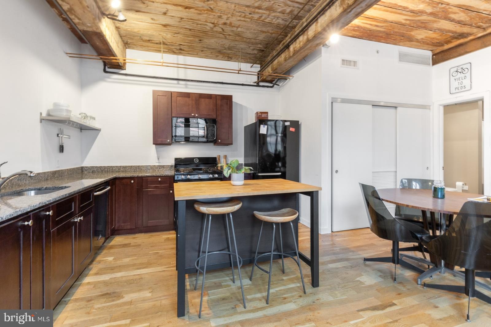 Available Early June:

Welcome to 1737 N Howard St #2B! This is an incredible modern-industrial 1 bedroom, 1 bathroom apartment featuring in-unit laundry, hardwood floors, recessed lighting, and central air for comfort all year long. Exposed beams and brick walls run the full length of the unit for an elevated atmosphere. Enter into the large kitchen area boasting ample cabinetry, granite counters, and a full lineup of sleek black appliances. The common area is flooded in sunlight and offers great space for your furnishings. There's a hall closet with your stacked washer and dryer for added convenience. Continue back to your bedroom offering 2 closets and tons of natural light - perfect for your plants! The beautiful jack & jill bathroom features tile flooring, a bathtub-shower combo, exposed spiral ductwork, and a granite-topped vanity for storage. Schedule your tour today!

Lease Terms:

Generally, 1st month, 12th month, and 1 month security deposit due at, or prior to, lease signing. Other terms may be required by Landlord. $55 application fee per applicant. Pets are conditional on owner's approval and may require an additional fee, if accepted. (Generally, $500/dog and $250/cat). Please note there is a 35lb weight limit for pets. Tenants responsible for: electricity, gas, cable/internet, and a $35/month flat water fee. Landlord Requirements: Applicants to make 3x the monthly rent in verifiable net income, credit history to be considered (i.e. no active collections), no evictions within the past 4 years, and must have a verifiable rental history with on-time rental payments. Exceptions to this criteria may exist under the law and will be considered.