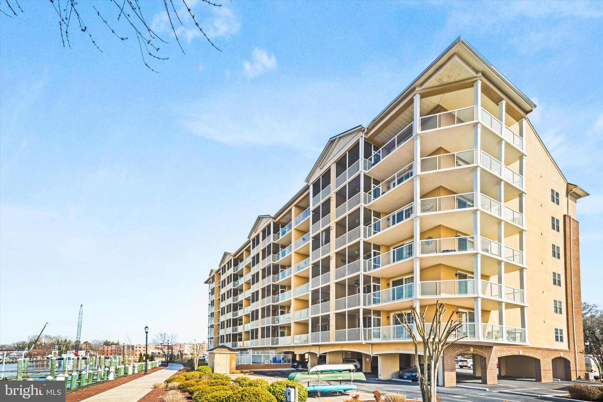 Welcome to an exceptional opportunity to own a low-maintenance 3BR, 2.5BA residence offering 1,629 square feet of comfortable living with beautiful views of the Wicomico River. From this elevated setting, enjoy breathtaking sunsets, lively marina scenes, and frequent sightings of local wildlife — including majestic bald eagles. Residences in this building are rarely available, making this offering especially unique. The thoughtfully designed kitchen opens seamlessly into the spacious living and dining area, creating an inviting space for everyday living and entertaining. An electric fireplace adds warmth and charm, while sliding glass doors lead to your private outdoor retreat. Relax year-round on the screened porch, or unwind in the additional open yet private seating area — perfect for morning coffee or evening cocktails overlooking the water. The primary suite is a peaceful escape featuring a tray ceiling, cozy sitting area, two closets, and direct balcony access. Brand-new Kazakhstan wool Berber carpet has just been installed, adding both comfort and sophistication. Two additional bedrooms are generously sized and share a well-appointed full bath, with one guest room offering private access for a suite-like experience.
A separate powder room, spacious walk-in storage area, and dedicated laundry room complete with washer, brand-new dryer, granite countertop, and cabinetry provide added convenience. The kitchen also features brand-new appliances, ensuring a fresh and move-in-ready feel. An exterior storage room located just outside the unit offers additional private space. Residents enjoy secure front and rear entrances, two elevators, climate-controlled lobbies, beautifully maintained riverfront landscaping, an assigned parking space, ample guest parking, and access to the riverfront outdoor pool. Ideally located in downtown Salisbury, you’re just steps from restaurants, shops, and entertainment, with the hospital only a few blocks away and Salisbury University minutes from your door. With continued downtown revitalization and exciting new cultural additions, River Place delivers not just a home — but a true waterfront lifestyle. Schedule your private tour today before this rare opportunity is gone.  Some rooms have been virtually staged.