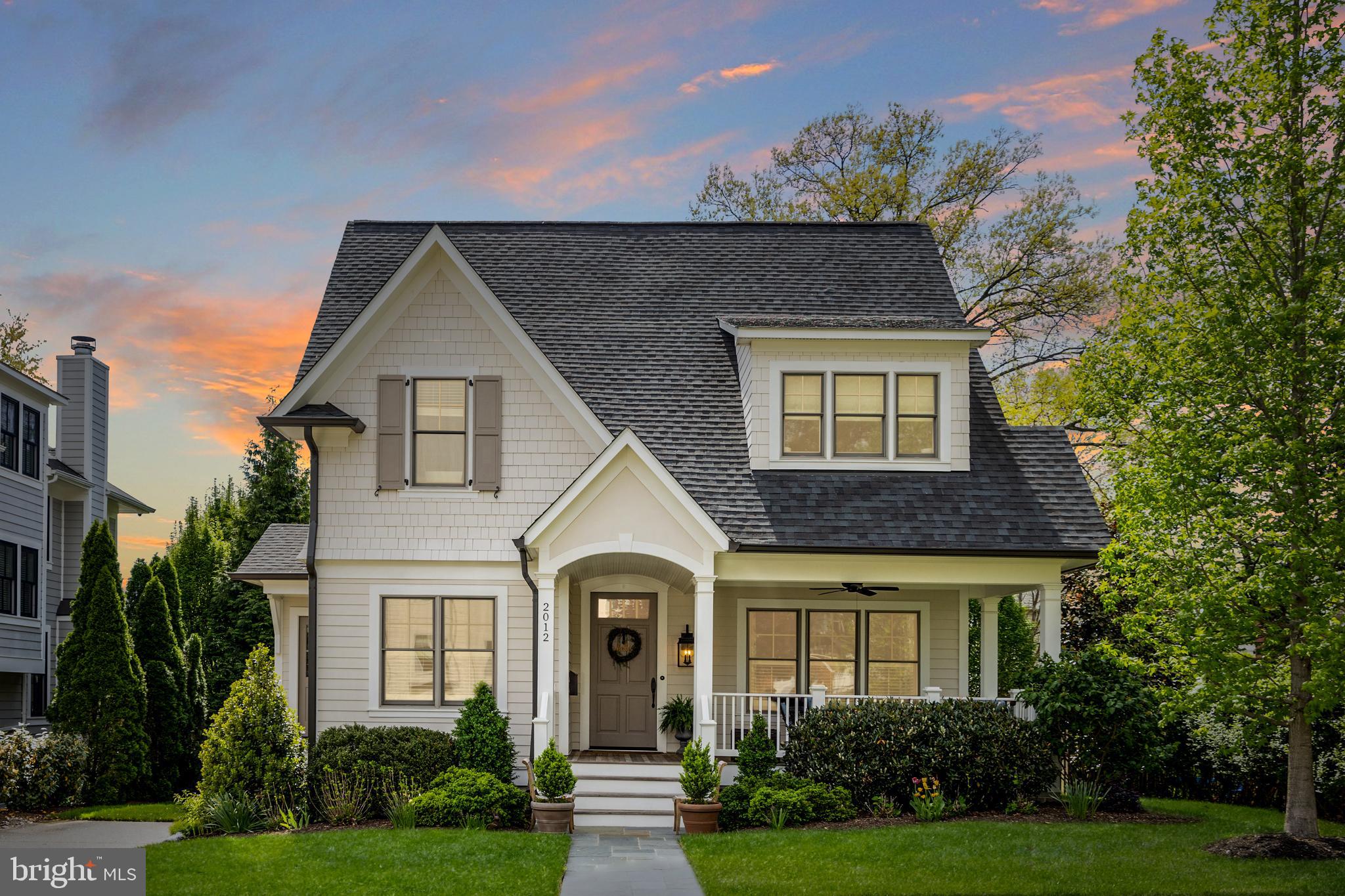 Welcome to 2012 N Jefferson Street , a stunning BCN custom home built in 2018 and meticulously maintained by the owners. Offering nearly 5,000 square feet of beautifully designed living space in the highly sought-after Yorktown High School pyramid. The welcoming front porch with Ipe decking leads into a thoughtfully designed interior featuring high ceilings, large windows, extensive millwork, custom moldings, high-quality finishes, designer lighting, and hardwood floors throughout the main and upper levels. The main level is perfectly suited for both everyday living and entertaining, offering a private home office filled with natural light, formal dining room, spacious mudroom with side entrance, built-ins and command center,  half bath and an open-concept family room with custom cabinetry and a gas fireplace with door leading to deck. The gourmet kitchen is the centerpiece of the home, featuring quartz countertops, a large island with hidden storage and seating, Wolf gas range, marble backsplash, high-end appliances, walk-in pantry, butler’s pantry with wine refrigerator, and a spacious breakfast area overlooking the beautiful, professionally landscaped backyard.  Upstairs, the luxurious primary suite features dual custom walk-in closets and a spa-inspired bath with radiant heated floors, oversized shower, dual vanity,  soaking tub, and private water closet. Three additional bedrooms include custom closet organizers, a Jack-and-Jill bath, and a private ensuite bedroom. The light-filled lower level offers exceptional flexibility with high ceilings and oversized windows, including a large recreation room, fifth bedroom with adjoining full bath, bonus/flex room ideal for a home office or home gym space, a storage room, and spacious laundry room with sink and storage. A convenient laundry chute accessible from all three levels adds to the home’s thoughtful design. Outdoor spaces are equally impressive, with rear Ipe decking ideal for dining and entertaining, mature landscaping, charming storage shed, and a decorative water retention system. Additional highlights include recessed lighting,  built-in ceiling speakers, TV mounts, extra WAP device, and dedicated cable/ethernet connections throughout for seamless streaming and connectivity throughout the home. Conveniently located minutes to Westover shops and restaurants, grocery stores, parks, commuter routes, Tysons, and Washington, DC, this exceptional home combines timeless charm with modern luxury and functionality.  Meticulously maintained and truly turnkey, this cottage-inspired custom home offers the perfect balance of character, comfort, and convenience in one of North Arlington’s most desirable locations. OFFER DEADLINE MONDAY, May 18th at 5 PM.