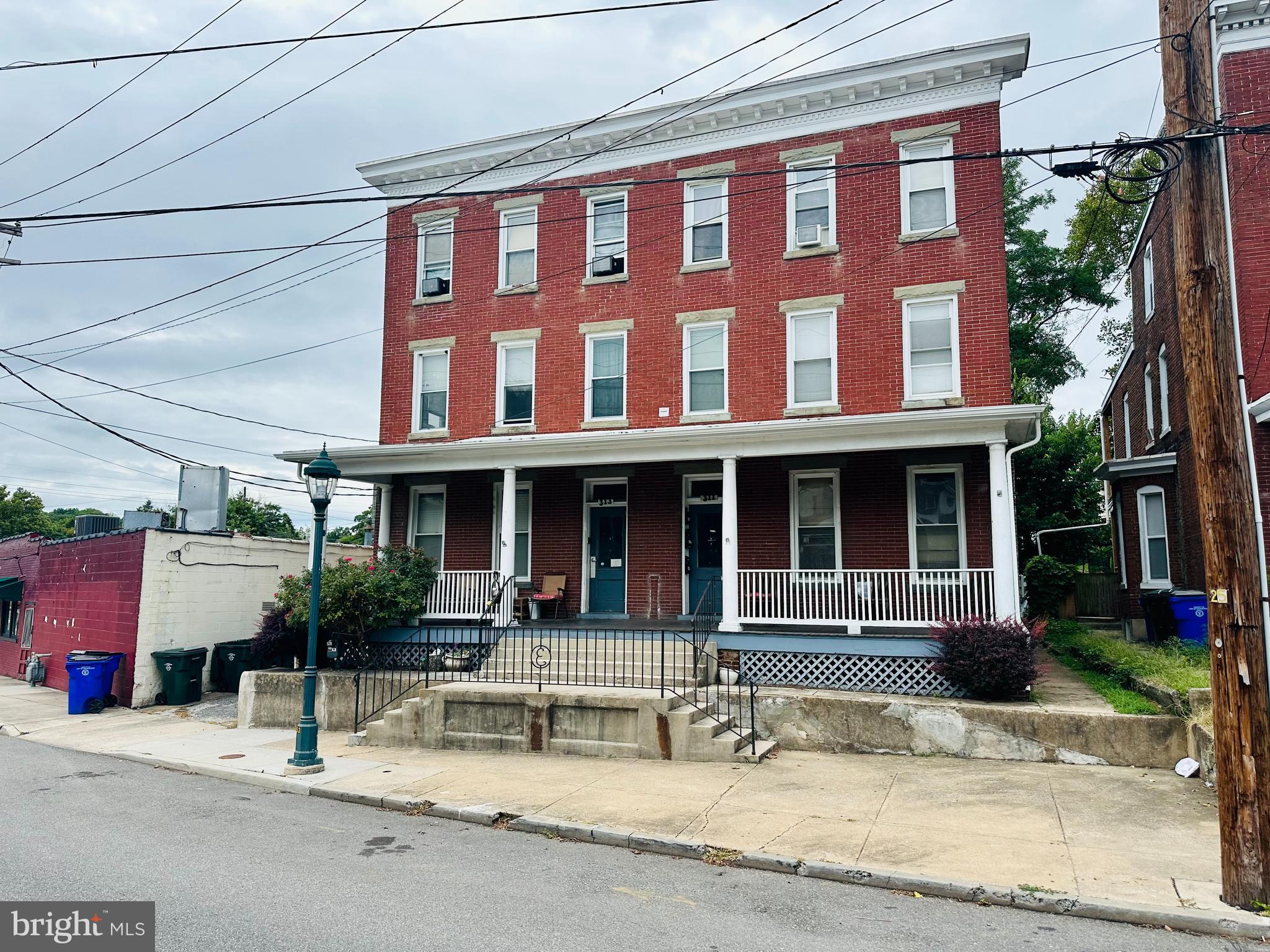 Great positive cashflow investment opportunity!  Well maintained 6 unit apartment building not far from beautiful City Park, Meritus Park, University of Maryland Hagerstown Campus, Barbara Ingram School of the Arts, Maryland Theatre, restaurants and more!  This building is fully occupied and produces approximately $4,700 a month in income!  Natural gas radiant heat!  Each unit is 1 bedroom and 1 bathroom. Large backyard, detached garage.  The owner will consider holding owner financing.  Owner is also selling 419 Summit Ave with 5 units.