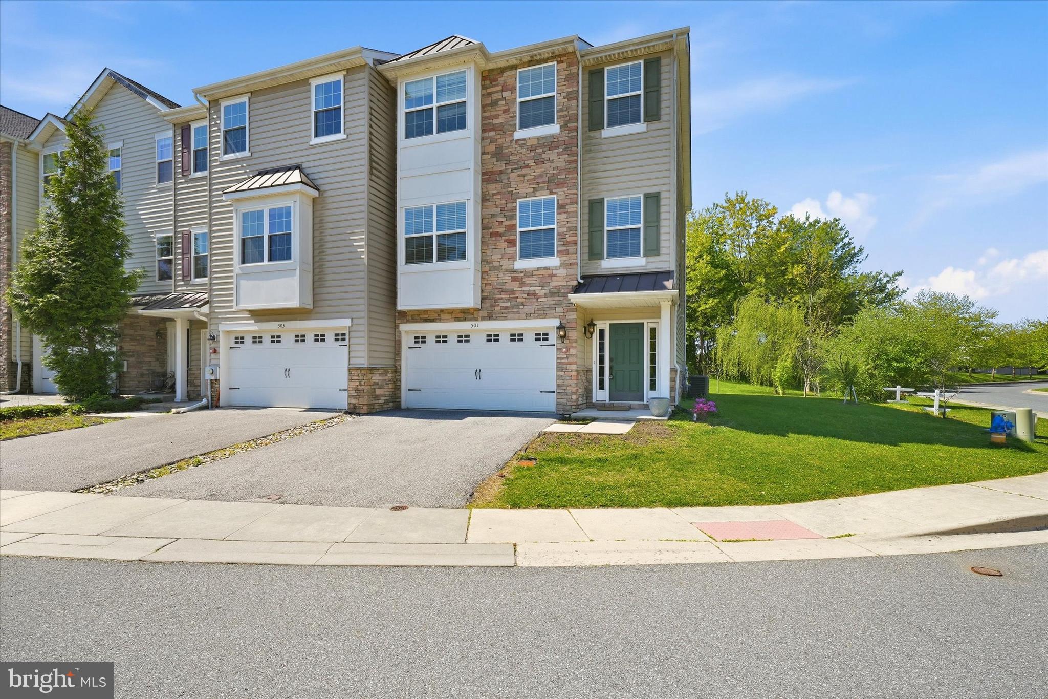 Welcome to Greene at Twin Lakes –  this well-maintained, three-story end-unit townhouse featuring four bedrooms and 2.5 baths, located just minutes from I-95 and the University of Delaware, and within walking distance to Newark Charter School.

The lower level offers a walk-out bedroom with a walk-in closet and a bonus workout area. Sliding glass doors lead to a patio with views of the tree line and a nearby pond. This level also includes interior garage access and laundry room.

The second floor features an open floor plan ideal for entertaining, including a spacious living room with engineered hardwoods and recessed lighting. The large eat-in kitchen is equipped with granite countertops, stainless steel appliances, and gas cooking. Sliding doors on this level provide the opportunity to add a custom deck.

The third level houses the primary suite, which includes an extra-large en-suite bathroom with a glass-enclosed shower, a soaking tub, and a double-sink granite vanity. For convenience, a second laundry hook up is located on this floor, along with two additional spacious bedrooms and a second full bath.  The whole interior house has been newly painted.