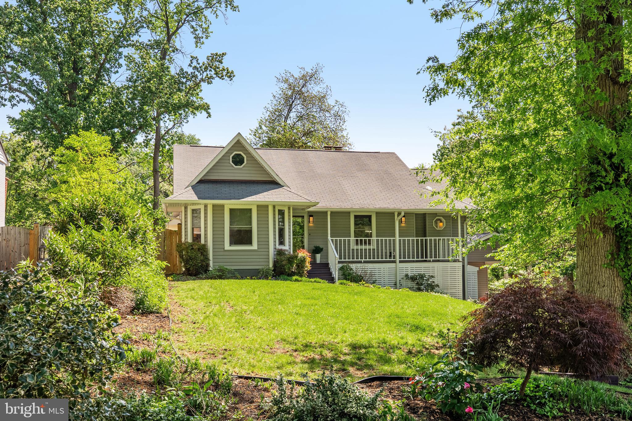 Tucked away on a quiet dead-end street, 7035 Swain Dr. is a 4-bedroom, 2.5-bathroom oversized bungalow set on an impressive 0.44-acre lot, offering privacy, space, and serenity. With no formal HOA and a community-oriented neighborhood, this home is a rare find in the heart of Alexandria, VA.
Entering through a charming front porch, step inside to discover an inviting main living area with cathedral ceilings and an abundance of natural light. A wood-burning fireplace anchors the space, creating a warm and cozy atmosphere. A gracious loft space, accessed by a spiral staircase, offers incredible flexibility; perfect as a bedroom, office, library, craft room, or secondary living space.  There is a primary en-suite on the main living level and two additional bedrooms and a full beautifully updated shared hall bath.
The updated eat-in kitchen features soft-close custom cabinetry, pull-out drawers, Corian countertops, and an octagonal dining nook, all designed for effortless functionality. The large back deck and lower-level concrete patio provide ample space for gracious outdoor entertaining. 
The fully finished lower level was recently remodeled to include a spacious fourth bedroom with a new walk-in closet, additional recessed lighting, fresh paint, and a stylish new laundry room with custom cabinetry, countertops, and under-cabinet lighting. A second fireplace makes the lower level a cozy retreat. A standout feature of the home is a recently built 2-car carport, complete with a finished bonus room—ideal for a studio, home office, or gym. 
Recent Upgrades & Improvements
This home has been thoughtfully upgraded over the years, including:
 2024: Custom-built 2-car carport with an insulated room added behind the carport, perfect for a studio or home gym.
 2025: Whole-house interior paint, laundry room remodel, basement renovation, recessed lighting, new outlets & switches, master bath updates, and deck improvements
 2024: New whole-house water softener system 
 2023: New custom stairwell window for additional natural light 
 2022: New Bosch dishwasher, new LG washer/dryer, and new exterior doors 
 2021: New roof-mounted solar attic fan, backyard storage shed, new flooring in kitchen, solar tubes for natural light
 2018–2020: Upgraded gutters, master bath vanity & lighting, and front deck improvements
 2015: Kitchen refresh with new cabinetry, hardware, countertops, and crown molding
The oversized lot provides a large backyard, perfect for gardening, pets, and play. The cathedral ceilings, two fireplaces, and cozy bedrooms create an inviting ambiance, while multiple entertainment spaces—both indoors and out—make hosting a dream.
With its expansive lot, unique layout, fresh updates, and fantastic location near both urban conveniences and nature escapes, this property offers both charm and versatility—a perfect place to call home.  
Perfectly positioned for commuters, 7035 Swain is located just minutes from Old Town Alexandria, the Pentagon, Huntington Metro, Washington, D.C., Fort Belvoir, and effortless access to major commuter routes, including 495, the Wilson Bridge, and the GW Parkway, while being just moments from the scenic trails and wetlands of Huntley Meadows Park. The Groveton Civic Association fosters a friendly, engaged community, with neighbors who take pride in their homes and love to gather outside in warm weather.
Welcome home!