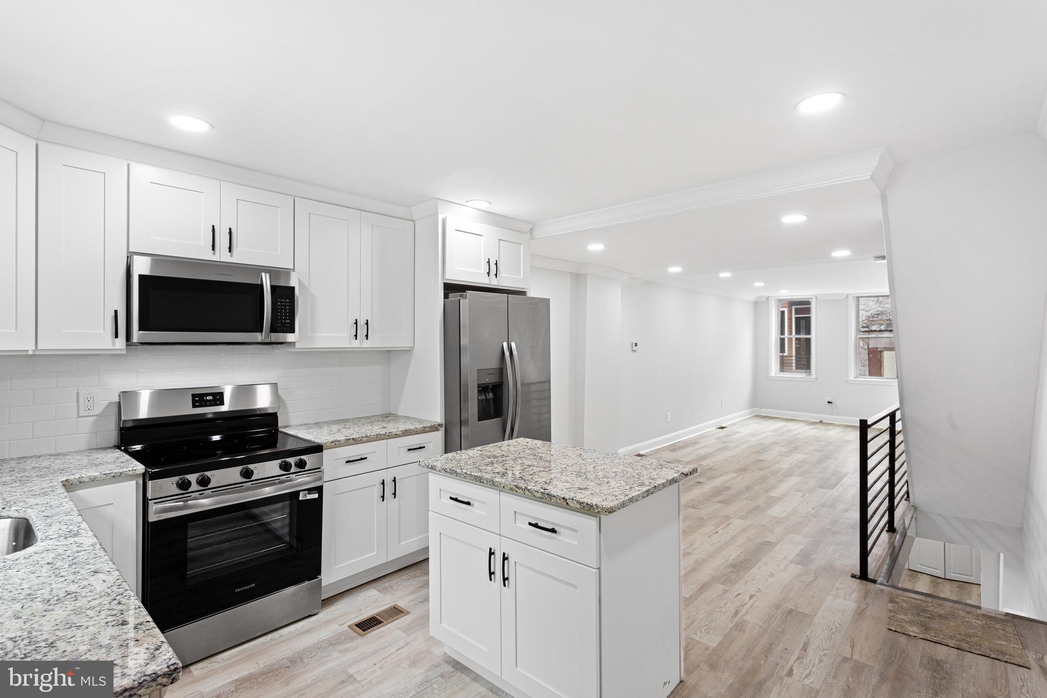 THIS HOME QUALIFIES FOR SPECIAL FINANCING FNB PROGRAM. 100% FINANCING, NO PMI, UP TO $5,000 TOWARDS CLOSING COST. This fully renovated 2-bedroom, 2-bathroom home in the Point Breeze neighborhood of Philadelphia—perfect for buyers searching for modern city living with convenience and charm. Nestled on a tree lined street, this move-in-ready home offers the ideal blend of comfort, style, and location. Walk into an open-concept floor plan featuring natural light, brand-new flooring, and modern finishes throughout. A kitchen is designed to impress with granite countertops, a spacious island with storage, and stainless steel appliances, including a refrigerator with ice maker and water dispenser. As you walk upstairs, you’ll find two generously sized bedrooms, including a primary suite with a private ensuite bathroom. Both bathrooms are thoughtfully updated with sleek, modern finishes. The fully finished basement adds valuable living space—ideal for a home office, gym, media room, or guest area—along with ample storage. BONUS: A BRAND NEW SEWER LINE PROVIDES ADDED PEACE OF MIND FOR FUTURE HOMEOWNERS. Enjoy outdoor living in your private backyard patio—perfect for relaxing, grilling, or hosting guests. Located in one of Philadelphia’s fastest-growing neighborhoods, this home is within walking distance to Washington Avenue and surrounded by local favorites including restaurants, coffee shops, gyms, yoga studios, and farmers markets. Easy access to SEPTA public transportation, including the Broad Street Line and major bus routes, makes commuting to Center City, University City, and the South Philadelphia Sports Complex effortless. This is your opportunity to own a turnkey home in Point Breeze—ideal for first-time homebuyers, investors, or anyone looking for a modern Philadelphia rowhome in a prime location.