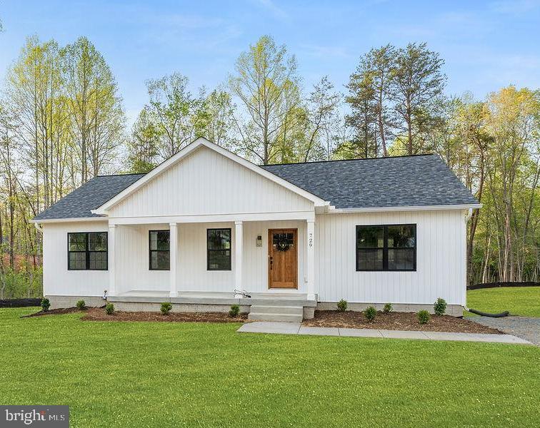 Completed new construction! Introducing The Boxwood by Ironwood Homes, beautifully situated on 1.76 acres. Blending timeless country charm with modern design, this thoughtfully crafted home offers the perfect balance of style, comfort, and functionality for today's lifestyle.

The open-concept floor plan creates a bright, airy living space, while premium finishes throughout give the home a custom feel. Highlights include a luxurious primary bathroom, farmhouse sink, exposed natural beams, quartz countertops, stainless steel appliances, hardwood floors, custom-look light fixtures, a freestanding soaking tub, and beautifully selected tile finishes.

This spacious ranch-style home features 5 bedrooms and 3 full bathrooms, with a fully finished basement offering an additional bedroom, full bath, and a large recreation area—perfect for guests, entertaining, or extra living space.

Don't miss your opportunity to own this exceptional new home! Landscaping has been virtually enhanced.