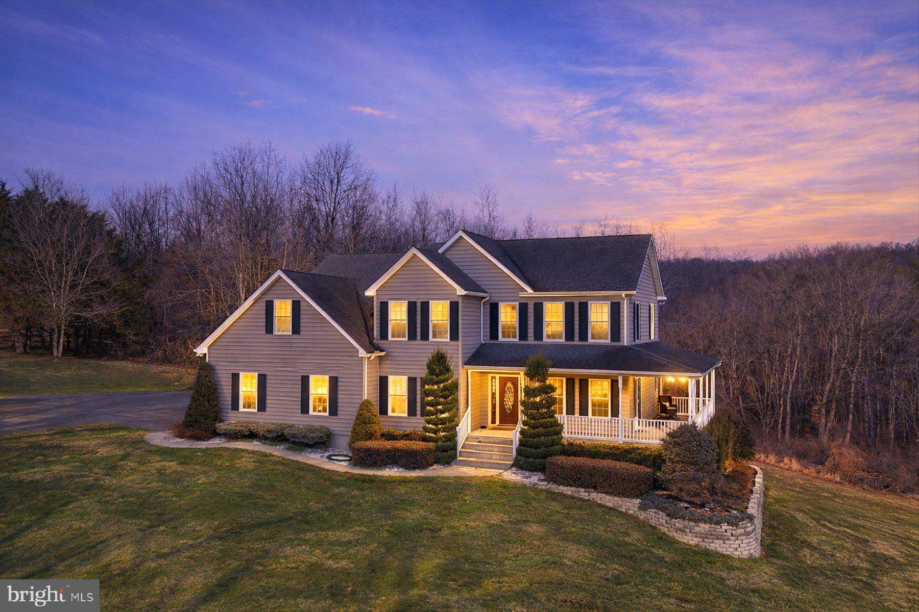 Welcome to your private retreat in the heart of northern Harford County. Nestled on 7.61 scenic acres in Street, Maryland, this custom-built 4-bedroom, 2.5-bath home offers the perfect blend of space, privacy, and modern comfort. Built in 2001, the property provides peaceful rural living while still offering convenient access to surrounding Harford County amenities.

Inside, the home features a bright open floor plan with 9-foot ceilings and spacious living areas designed for both everyday living and entertaining. The family room features vaulted ceilings and flows seamlessly into the dining area and large gourmet kitchen, creating a warm and inviting central gathering space. Architectural details throughout the home include tray ceilings in the dining room and half bath, along with skylights and vaulted ceilings in both full bathrooms that fill the home with natural light. The primary bedroom features vaulted ceilings with a bonus sitting area and dual closets, providing a comfortable private retreat.

The property offers beautiful open space with 2.5 acres currently enrolled in the Conservation Reserve Program, helping preserve the surrounding natural setting while providing additional privacy. The land also provides flexibility for future outbuildings or hobby farming opportunities.

This home has been meticulously maintained and updated over the years. Major improvements include new windows in 2021, a gas hot water heater installed in 2023, HVAC systems replaced in 2017 and 2019, and a well pump replaced in 2012. The home has also been freshly repainted between 2020 and 2025 and features updated lighting fixtures throughout the interior and exterior. Additional improvements include new wall outlets and receptacles installed throughout most of the home in 2025 and new basement carpet installed in 2025.

The partially finished basement, approximately 60% complete, provides additional living space and includes rough-in plumbing for a future full bathroom along with substantial storage areas. Additional features include a central vacuum system, radon mitigation system, Andersen sliding glass doors, and high-speed fiber internet service. The home is serviced by a buried and fully owned 500-gallon propane tank that fuels the hot water heater, fireplace, stove, and emergency heat.

Outside, the property features professional landscaping, a blacktop driveway, and a spacious three-car garage with an extra-tall third bay designed to accommodate oversized vehicles or equipment. If you’ve been searching for a beautifully maintained home with acreage, privacy, and modern upgrades in northern Harford County, this exceptional Street property offers a rare opportunity to enjoy country living with comfort and convenience.
