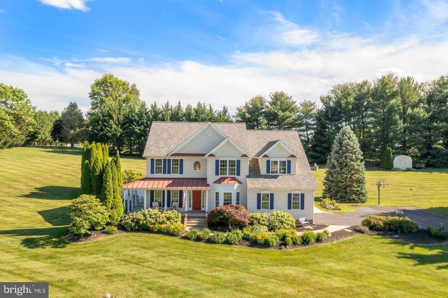 Welcome to 1687 Village Green Drive in Woodbine, MD! This stunning five-bedroom,three-and-a-half bath home combines traditional elegance with modern comfort. Step inside to find beautiful crown molding throughout the 1st floor and a spacious combination kitchen and dining area, perfect for entertaining. The cozy family room, complete with a gas fireplace, creates a warm and inviting atmosphere. the primery luxurious suite has a full bath with spa-like elements includes separate vanities and a generous walk-in closet. Of the 3 other bedrooms upstairs, one bedroom has built-in shelving with a window bench seating area with storage below. The second bathroom on the second floor has dual vanities. completely beautiful finished basement, you will be amazed at the elegant entertainment room. outside, you'll enjoy a sparkling heated pool, perfect for relaxation, and the outside is an entertainer's delight, with a beautiful fire pit and seating area perfect for relaxing and watching the sunrise or sunset. Don't miss the chance to make this exceptional property your own!