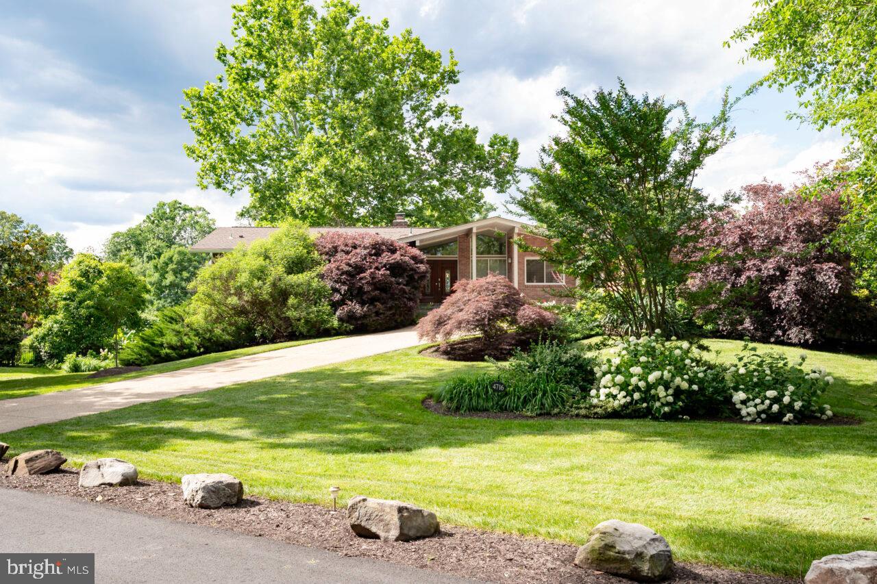 Rare offering! Spectacular waterfront  midcentury modern home with roughly 190 feet of water frontage  backing the  property  roughly 60 feet from water's edge. Private floating dock and  boat lift  in your back yard,  both new in 2018.  Less than 5 minutes by boat to the Potomac and beyond.    Wonderful large heated  pool with diving board (replastered and relined in 2021) surrounded by  marble pool deck (new in 2020.).  Five bedroom four full bath house fabulous for boating and entertaining! Two fireplaces one wood and one gas. 
Live on one level if you choose or enjoy all 4100 SF as the finished above grade lower level has kitchenette and second washer/dryer not to mention a 98 bottle Thermidor wine refrigerator as well as approximately 30 bottle Whirlpool wine cooler.  The space is designed to be Ideal for the privacy of  family and guests.
Renovations and upgrades galore.  Kitchen is a chef's dream. Blue Star stainless range top  with 6 burners including a 25,000  a BTU  burner and burner with special simmer setting.  .  VentAHood island range hood, Miele dishwasher, Blue Star refrigerator stainless steel inside and out and Wolf double oven
Lush  landscaping with blooms staggered throughout the season and a 15 zone irrigation system.  Light abounds through walls of glass,  multiple windows and soaring ceilings.