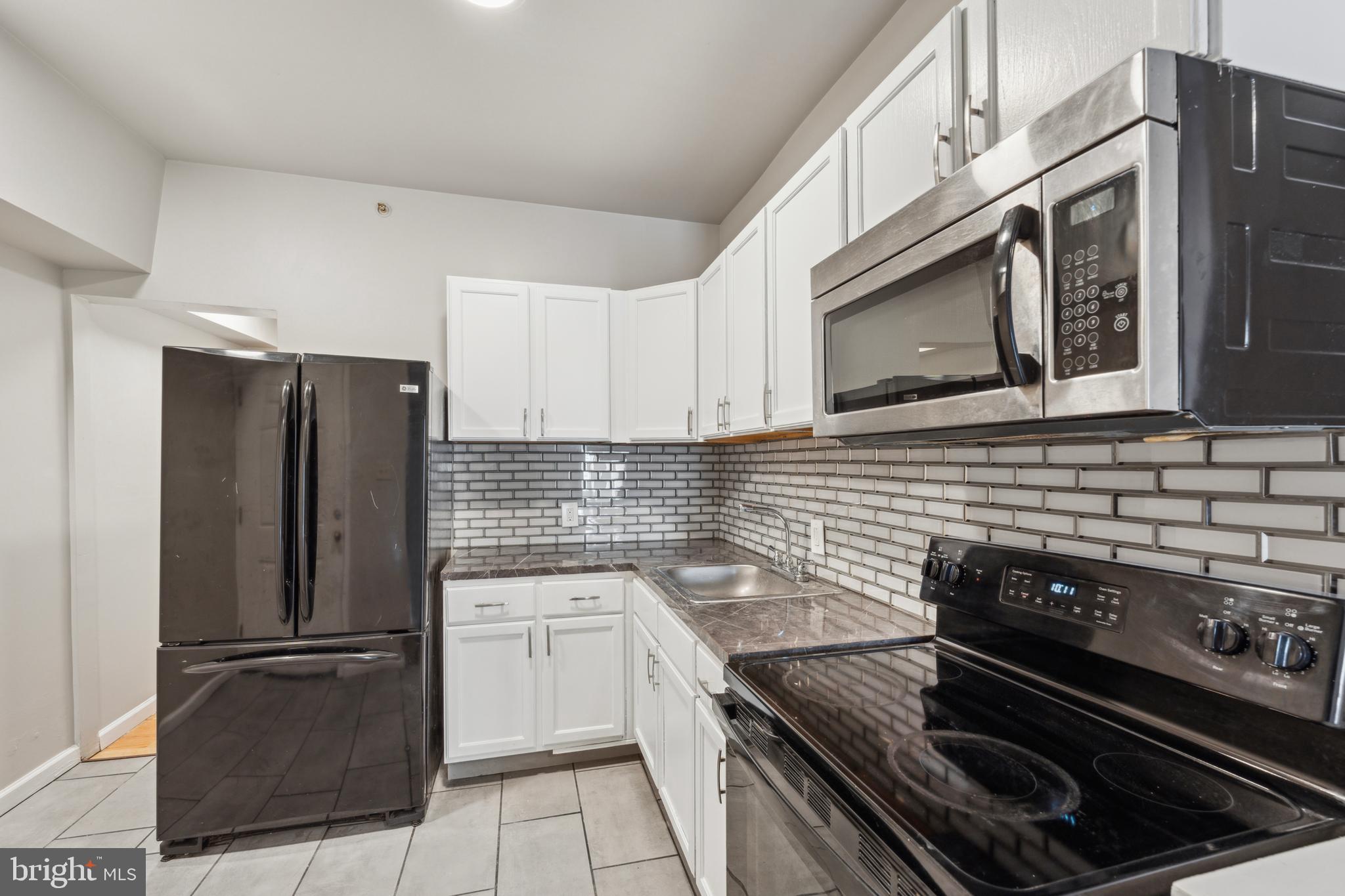 SELLERS ARE OFFERING $20,000 IN SELLER ASSIST!! Use it toward closing costs, an interest rate buy-down, or even repairs and updates to make this home your own! Welcome to 1615 W. Westmoreland Street – a renovated legal triplex located in a prime location, just blocks from Temple Hospital. Whether you're an investor or an aspiring homeowner looking to house hack, this property offers a winning combination of modern updates and long-term rental appeal. Two spacious 2-bedroom units on the first and second floors, including a vacant second-floor unit, ideal for an owner-occupant or additional rental income. One cozy 1-bedroom unit on the third floor with long-term tenants. Each unit boasts updated flooring, sleek kitchens with stainless steel appliances, and the convenience of an in-unit washer/dryer in the first and third floor units. A full unfinished basement offers storage or potential for future upgrades. Separate meters and utilities ensure easy management and tenant responsibility. Renovated and ready to go, this triplex minimizes upfront costs and maintenance headaches. Move into the vacant unit and let your tenants help pay the mortgage, or rent all three units for maximum income potential.  Located near Temple Hospital, this property appeals to medical professionals, students, and staff, ensuring a consistent pool of potential tenants. Whether you're building your portfolio or looking to offset your living expenses, 1615 W. Westmoreland Street is the opportunity you've been waiting for. Schedule a showing today!
