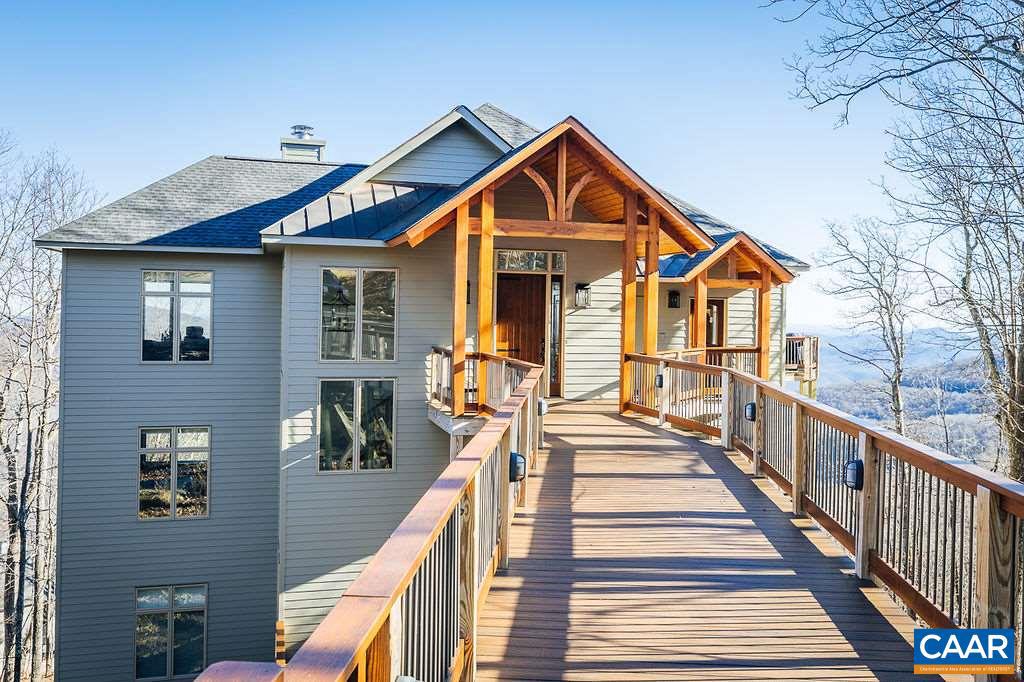 One of the most spectacular views at Wintergreen and in a private location with views through Shamokin Gorge into the Rockfish Valley. Lots of closets and ample storage space- home has an elevator so no steps from car to kitchen. 3-zone HVAC system, 2 sets of high end washer & dryers, 2 dishwashers, 2 refrigerators, 4 gas fireplaces, 3 smart TV's, Trex decking with redwood handrails, highway grade parking pad, 2 piggy-backed Rinnai gas water heater. House is being sold furnished- Natuzzi leather sofas, Baker sofa & office furniture in study, Sherrilll chair, Kitchen-Aid appliances, 3 TV viewing rooms, etc. solid wood bed frames. This is one of the newest and best homes on the mountain. heat pump upper level lower levels gas heat,Glass Front Cabinets,Granite Counter,Maple Cabinets,Wood Cabinets,Fireplace in Bedroom,Fireplace in Great Room,Fireplace in Master Bedroom,Fireplace in Sun Room
