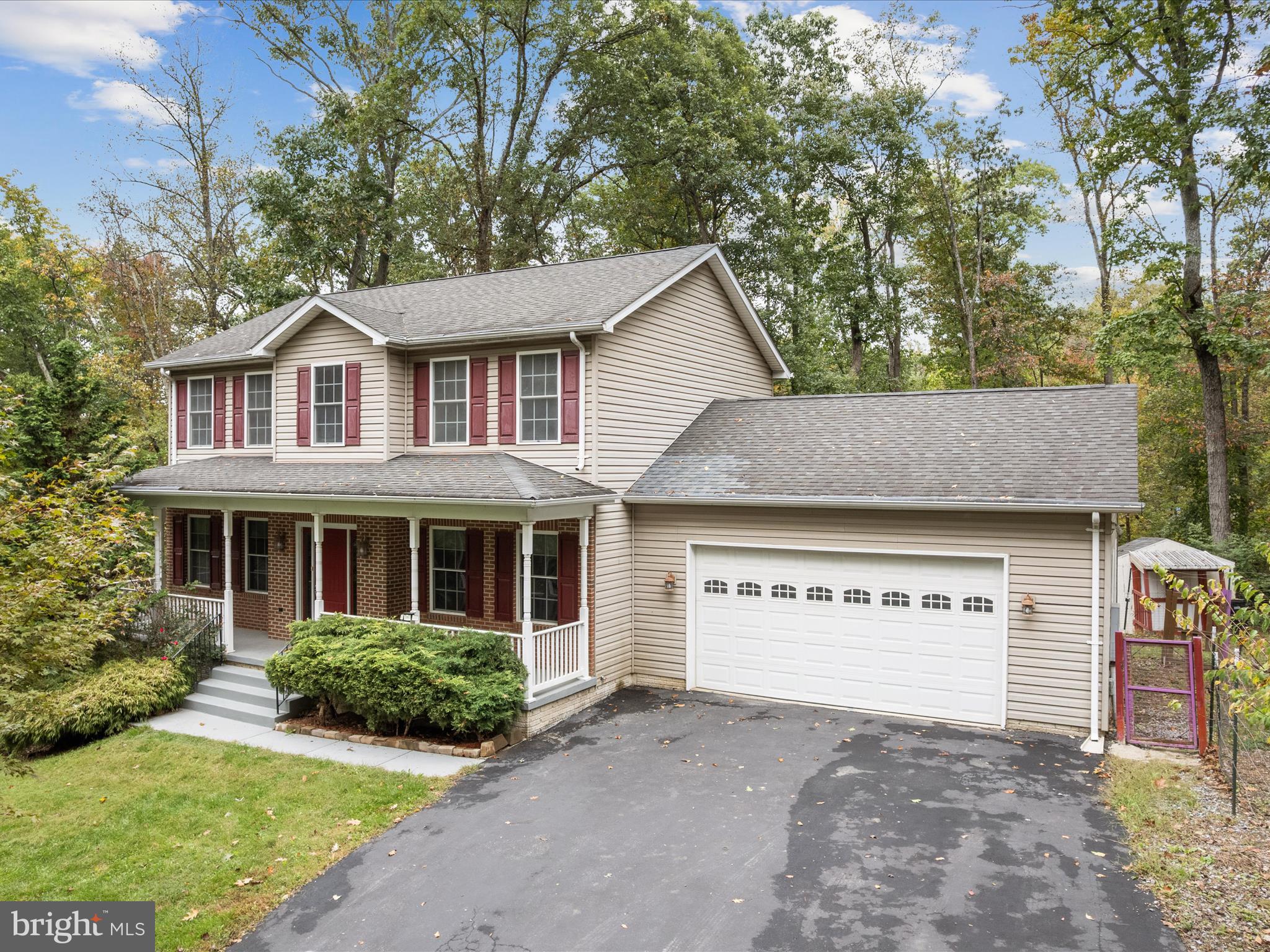 Welcome to this beautifully maintained 3-bedroom, 3.5-bath single-family home nestled on a serene .75 acre lot surrounded by mature landscaping and vibrant gardens. Immerse yourself in nature’s beauty, with the lake and private beach only a brief walk away. Step inside to find a bright and inviting layout featuring spacious living areas, a modern kitchen, and a fully finished walkout basement complete with a wet bar, ideal for entertaining or relaxing. The home is filled with numerous windows that bring in natural light and offer scenic views of the lush surroundings. Outdoor enthusiasts will love the beautifully landscaped yard, thoughtfully designed with blooming rose bushes, fruit trees (peach & apple), and two flourishing mint  gardens, a gardener’s dream come true. Experience the best of both worlds: tranquil country living with easy access to Maryland and Virginia, just a short drive away. With recreation and local conveniences at your doorstep step your outdoor adventures are endless.  Whether it’s your full-time home or a weekend escape, this property provides the perfect place to unwind and enjoy life at your own pace.
