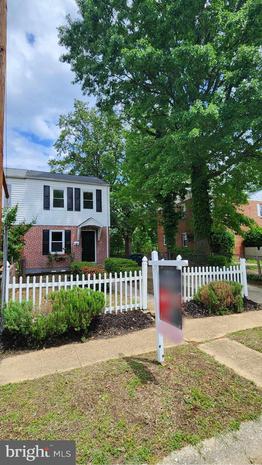 Nestled in the sought-after Huntington neighborhood with no HOA, this charming 3-bedroom, 2-bathroom home has been freshly painted throughout and offers unbeatable convenience just minutes from the Huntington Metro (essentially across the street!), major commuter routes like I-495, Route 1, and the GW Parkway, and a variety of shopping, dining, and entertainment options in Old Town Alexandria, National Harbor, and beyond. The thoughtfully designed layout includes 816 square feet above grade plus an additional 400+ square feet in the finished basement, which features a legal bedroom, full bath, and separate entrance—perfect for rental income or guest accommodations. The main level boasts gleaming wood floors,  a renovated kitchen with 42" toffee-colored maple cabinets, granite countertops, and stainless steel appliances, and a spacious living and dining area accented with chair rail that flows seamlessly to the large fenced backyard with a shed, ideal for outdoor entertaining. Upstairs, you'll find two cozy bedrooms with original hardwood under the plush new carpet, while the lower level offers flexible living space with new carpet, custom built-ins, and plenty of storage. Situated near the end of a quiet street with ample street parking, this home also includes a driveway that fits 2+ cars. A fantastic opportunity in an unbeatable location!