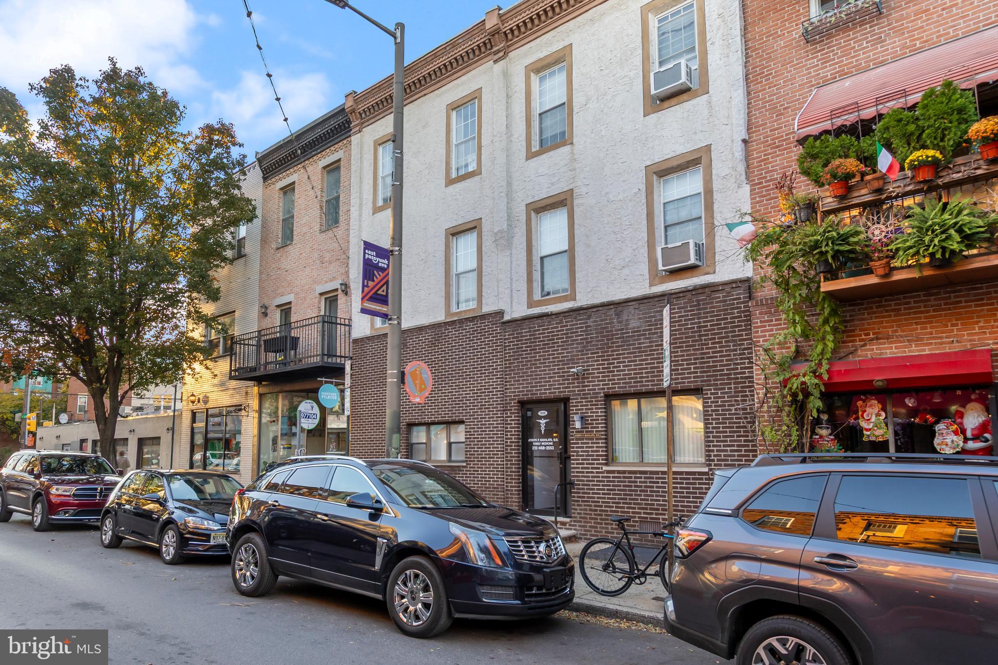 Rare Opportunity to Buy a Double Property along East Passyunk Avenue! Prime location and conveniently located! Double-wide, street to street, three unit mixed use building. This is a rare property that only comes along for sale once in a while. Legally it is two separate parcels - 1816 and 1818 E Passyunk Avenue  but functioning as one continual space. There is a main entrance on East Passyunk Avenue into the commercial space and then around on the S 13th St side there are two separate entrances for the apartments - respectively called 1811 and 1813 S 13th St. The first floor is currently set up as an office and will be delivered vacant upon closing. The apartments are occupied and under lease. Both apartments are bi-level 3 Bedroom units (2nd and 3rd fls). Both units are in good condition and currently occupied. All separate utilities (except cold water/sewer). Make your appointment today! Whether you are looking to expand your business or add this to the investment portfolio. Won't last long!