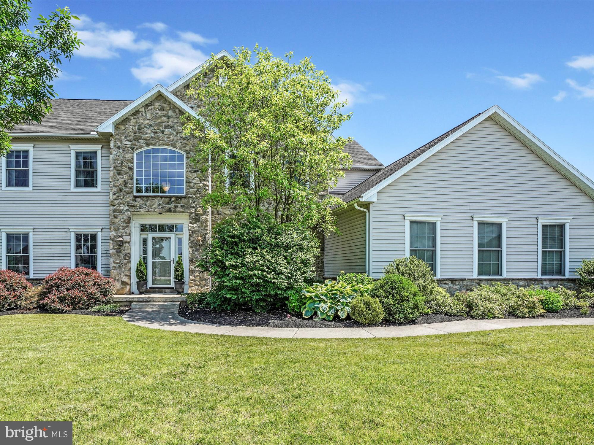 Don't miss out on this beautifully maintained 4BR/3.5BA Colonial in Central Schools boasting over 4000sqft of living space! You'll love all the details throughout this home. Formal living room w/ hardwood flooring & custom built-in shelving. French doors lead into a  formal dining room with hardwood flooring. The kitchen boasts granite counters, hardwood floors, a large island, double wall oven,  & table space for an additional dining area. Opens up to a main floor Family Room with gas fireplace. A powder room & mud room complete the main level. Upstairs you'll find a spacious Master Suite complete with a walk-in closet, soaking tub w/ separate stall shower, & a generous amount of cabinet space. This levels also contains 3 additional bedrooms, a full bath, & a convenient 2nd floor laundry room! The finished lower level is really special! The large space provides the opportunity to set up many different areas for whatever you may need- craft/work area, additional family room, possible bedroom area, exercise space, etc. Check out the custom playhouse! Also includes a full bath. Outside you can relax on the back patio overlooking a clear and level fenced backyard. 3 car garage, a large driveway, & separate shed provide plenty of parking & storage space. Seriously, you don't want to miss out on seeing this stunning home! Schedule your showing today!
