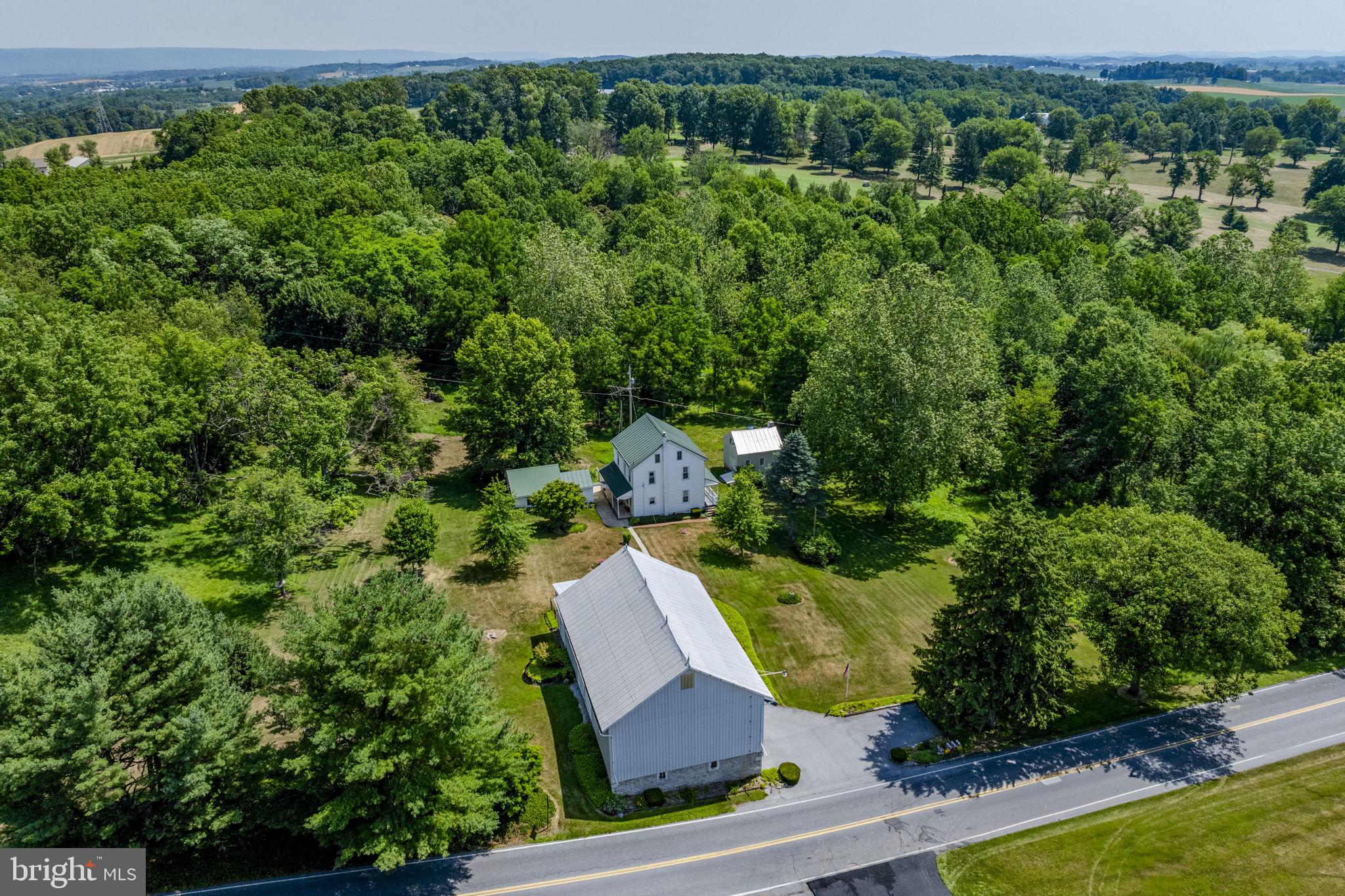 AUCTION PROPERTY.  AUCTION DATE - TUESDAY, September 15th @ 4PM.   List price is opening bid only and is not indicative of the final sale price. Property must go to auction. TERMS:  10% down day of auction, balance 60 days or before.  Buyer pays both transfer taxes (2% of sale price).  REAL ESTATE: 2 ½ story farm house w/eat-in kitchen w/updated cabinets & appliances, living room w/bay window, 1st floor laundry, 3 bedrooms, 1 ½ baths, attic, basement, oil HW baseboard heat & centra AC w/mini split.  OUTBUILDINGS: 2 story stone/frame bank barn/garage 34x52 w/2 car garage, separate stable area 26x30, full drive-in 2nd floor crop & equipment storage, masonry/frame 30x20 shop building & 24x16 spring house all on 13.1 ACRES w/2 ½ acres hay field, partial wooded w/spring fed pond & stream, lawn & garden area, on-site septic & spring water system.  Zoned AG.  NOTE:  After 59 years, owners downsizing to smaller quarters & serious to sell.  Great location. Borders Lebanon Valley Golf Course.  Easy access to Rt. 501, Rt. 422 & Rt. 78.  Minutes to Myerstown, Mt. Aetna, Richland & Lebanon.  Economical & low taxes.  Ideal as residence or investment.  OPEN HOUSE DATES: Saturday, August 29, September 5 & 12 from 1 to 4PM.