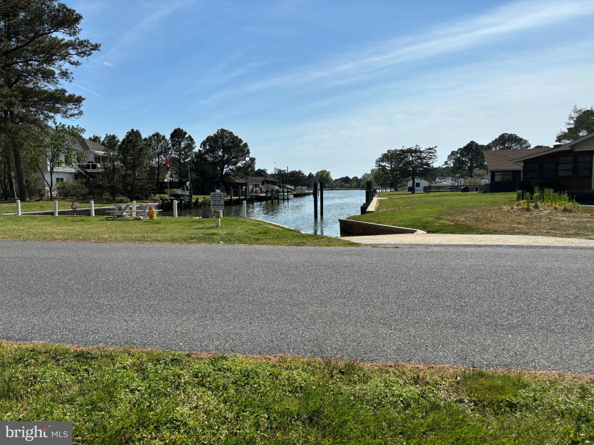 1.075 acre lot in the beautiful serene neighborhood of Hearts Ease. Partially cleared and partially wooded, this picturesque lot looks down the the canal onto Jones Creek with gorgeous views at all times of the day. Property includes a large boat shed, perfect for storing your boat after a day of sailing around the Chesapeake Bay and all of it's waterways.