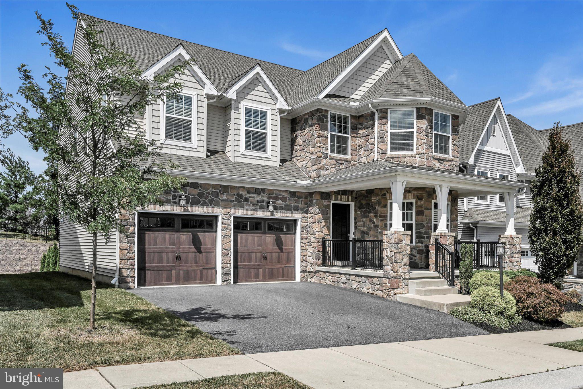 Welcome home to this lovingly maintained 4 bedroom 2 1/2 bath home in Worthington, Manheim Township. This well-built, open concept home with finished basement offers over 3500 square feet of living space. 
The 9 foot ceilings throughout the main floor and 2 story family room with stone fireplace offer abundant space for comfortable living. The family room, highlighted by a wall of windows with shaded glass and automatic blinds, is flooded with natural light, perfectly complementing the hardwood flooring that flows throughout the main level.
Be creative in the chef's  kitchen with transom windows featuring quartz countertops, lighted glass cabinetry and plenty of space to work and entertain. The formal dining room is complete with tray ceiling, wainscoting and bay window. The office space on the main level is currently used as a playroom.
The second level includes an elegant owner's suite with soaking tub and walk-in tile shower. Three additional bedrooms are generous in size, two with walk-in closets. For added convenience, the laundry room is on the second level. The owners have upgraded the carpet throughout the entire second level.
The lower level offers a cozy sitting area with shiplap trim, access window and area for recreation. An additional room, currently used as an office, is designed to be a 5th bedroom. The basement has a generous storage area with plumbing for a lower level bathroom.
The front lawn area includes a built-in irrigation system. Sliding doors lead from the eat-in kitchen area to an inviting Trex deck for entertaining and al fresco dining. Convenient walking/biking trails are located at the end of the cul-de-sac, providing a short walk to Nitrauer Elementary School.
Come see what this home has to offer. You'll be glad you did!