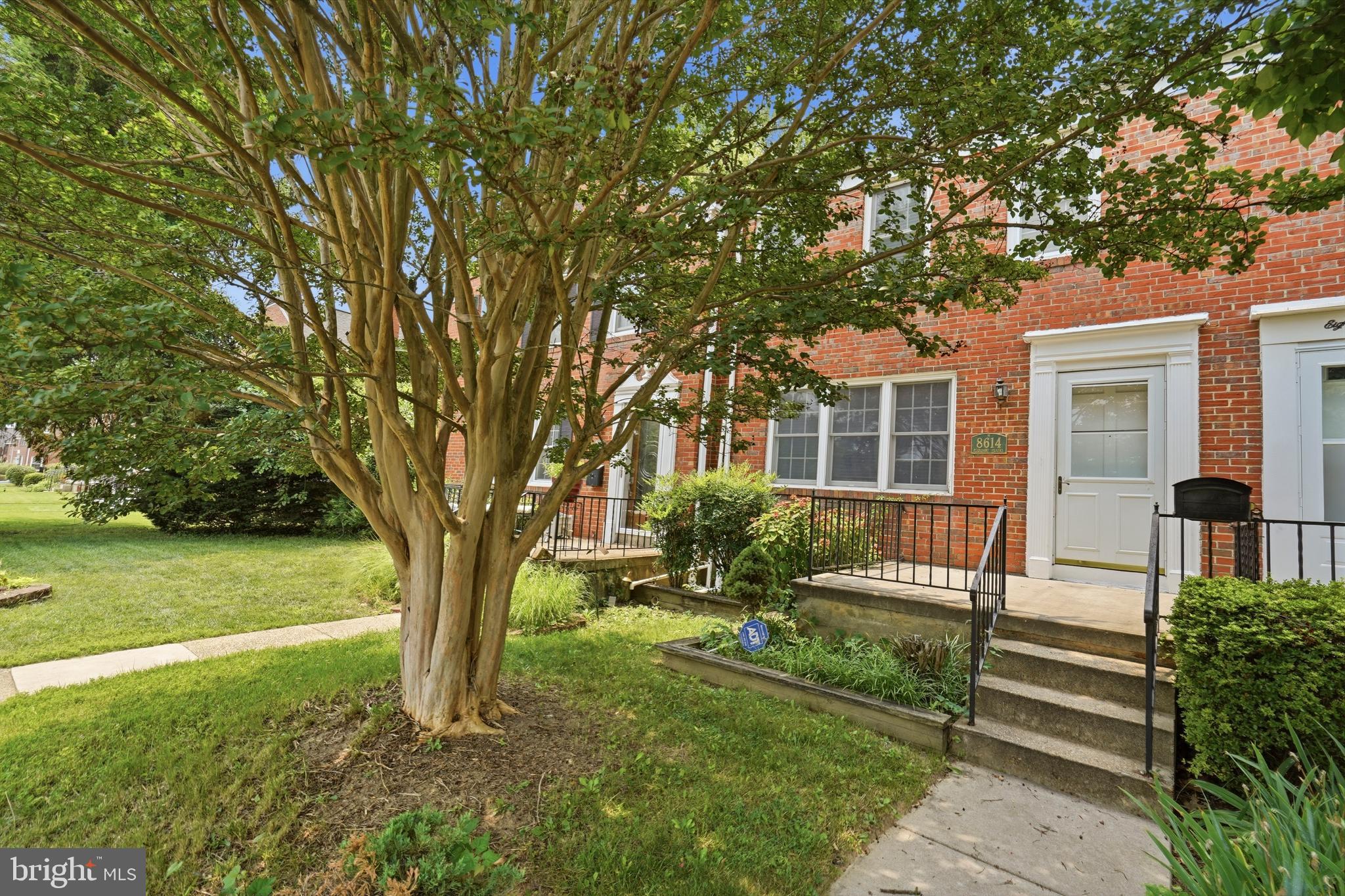 Beautifully updated 3 Bedroom 2 FULL bath BRICK Townhome in Loch Raven Manor * Features Include:  Front porch * Upgraded Kitchen  with stainless steel appliances and GRANITE countertops * SPACIOUS living room * Separate dining room * The UPPER level offers 3 bedrooms and a FULL Bath * On the LOWER level you will find a family room, full bath, PLENTY of storage and walk out  * GLEAMING hardwood floors  * Architectural shingle roof  2 years old * NEW carpet *  Fresh paint *  Hot Water Heater (2025)  * Fenced yard * Rear parking pad * Close to shopping and restaurants!!