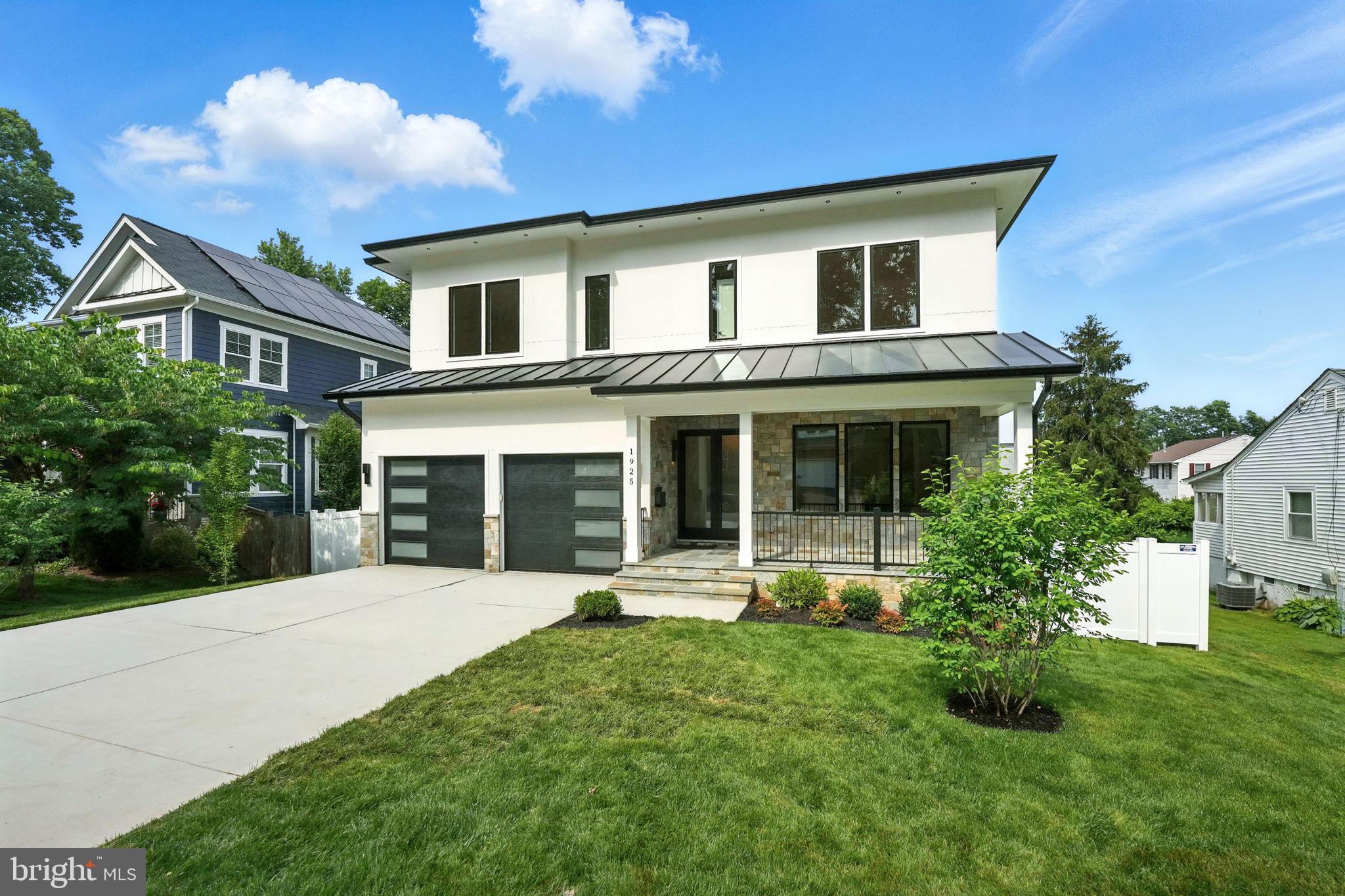 Back ACTIVE,  Buyers financing fell through 
Boasting approximately 6,300 square feet of open space, this modern home invites the most discerning
clients to appreciate the bold features yet the warmth of this stunning home. Crafted with the finest
materials and exquisite modern finishes, this home is filled with large, beautiful windows allowing an
abundance of natural light throughout, suspended ceilings and hardwood flooring on two levels and LVP on the lower level. Enjoy cooking in the spectacular Chef’s Kitchen which includes 42” cabinets, Quartz countertops, an expansive center island with a waterfall edge Quartz countertop, 2 modern pendant light fixtures, high-end appliances, a large walk-in pantry, and a separate dining area. The spacious family room has an electric fireplace and suspended ceiling. Additionally, there is a main level bedroom or office with an ensuite full bath. The Primary Bedroom Suite includes trey ceilings, an electric fireplace, a coffee wet bar with a beverage cooler, dual customized walk-in closets, a luxurious primary bath with dual Quartz vanities, and an oversized rain shower with body sprays as well as a separate soaking tub. The upper level also includes four private en suite bedrooms with their own private baths, a large laundry
room with tiled flooring, built-in cabinetry with a sink, and a  window allowing lots of sunlight. A sprawling walk-out lower-level entertainment area is full of sunlight and features a spectacular Quartz wet bar with a beverage/wine cooler, dishwasher, and glass shelves, a spacious rec room, a media room with wall sconces, a 7th bedroom with a walk-in closet, and a large full bath. The beautifully appointed exterior has a professionally manicured yard with a stone front porch, a fenced-in rear yard, a covered stone deck and a lower level stone patio off the back of the home, as well as a 2-car garage with modern slit garage doors.