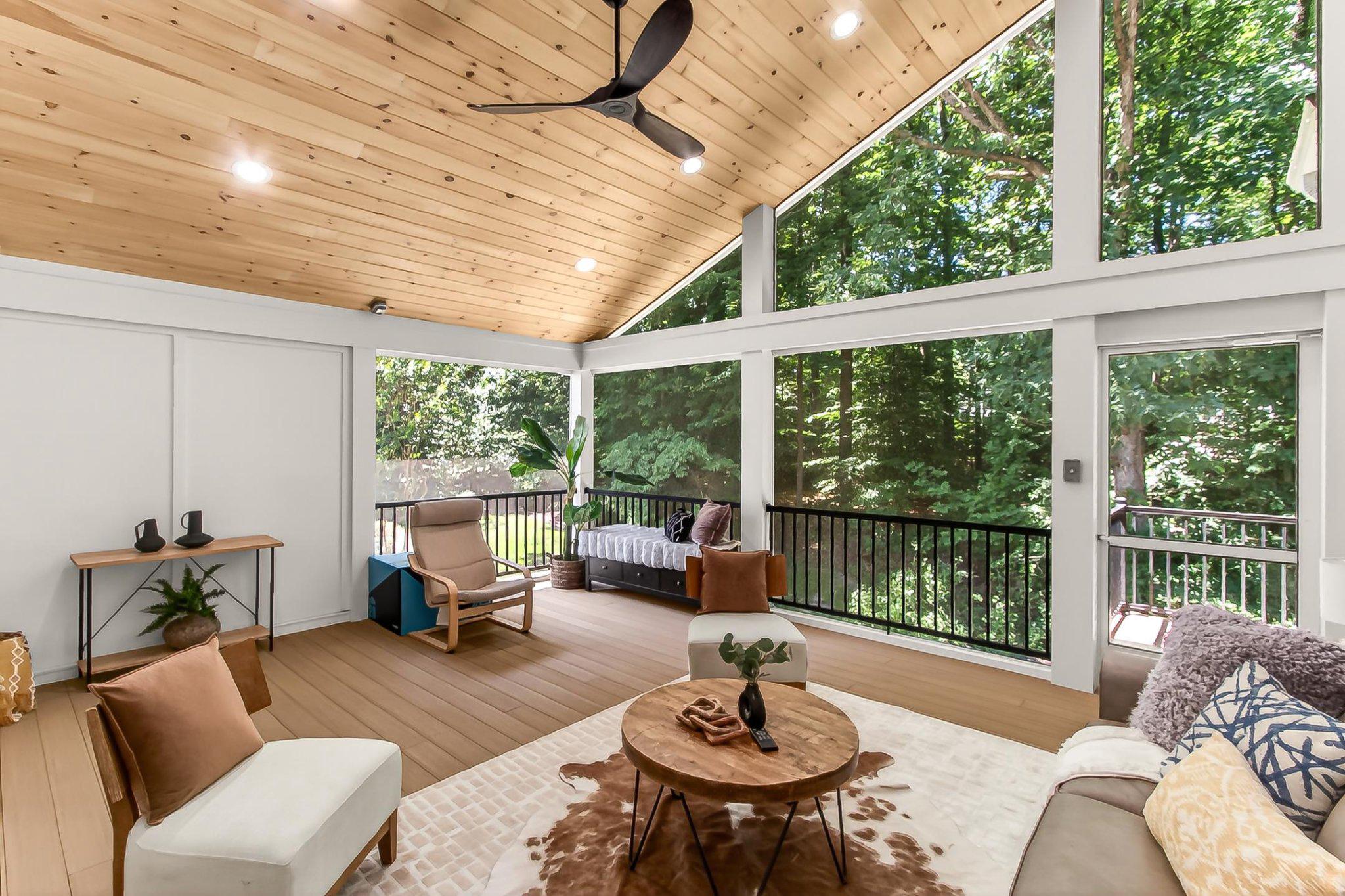 Open House 12-3, Sunday 6/7/2026. Don’t miss this stunning expanded Rutledge model with over 3,200 square feet in the highly sought-after Lakewood Hills community. The owners never expected to move after completing a $275,000+ addition, and it shows in every detail of this beautifully updated home. A beveled glass front door with elegant sidelights welcomes you inside, while gorgeous Brazilian hardwood floors flow throughout the main level. The impressive kitchen is designed for gathering and entertaining, featuring a massive 8-foot island, refreshed cabinetry with glass-front accents, two pantry cabinets, brand-new quartz countertops, and stainless-steel appliances including a double oven, built-in microwave, and bottom-freezer refrigerator. Recessed lighting and a stylish new island fixture complete the space. Sliding glass doors lead to one of the home’s true highlights   an incredible 320 square foot screened porch with a soaring vaulted natural wood ceiling. Composite flooring, metal railings, and vinyl-wrapped posts provide low-maintenance living, while the private backyard backs to trees, HOA open space, and a walking path with convenient access to Huntsman Lake, Huntsman Square Shopping Center, and more. The cozy living room features exposed beams, recessed lighting, and a gas fireplace with brick hearth, while the separate dining room offers additional gathering space. The thoughtfully designed addition includes a spacious main-level bedroom with high ceilings, recessed lighting, and a large walk-in closet. Nearby, the bright laundry room features a full-size washer and dryer, utility sink, storage drawers, and quartz counters. A built-in desk with scenic views creates an ideal work-from-home space, while a brand-new mudroom with bench seating, cubbies, and storage adds everyday convenience. A renovated powder room completes the main level. Upstairs are four generously sized bedrooms, all with Brazilian hardwood floors and ceiling fans, along with an updated hall bath. The luxurious primary suite features an expanded spa-inspired bath with an oversized shower and double vanity. The addition continues into an extraordinary dressing room/walk-in closet with custom built-ins, dedicated jewelry storage, and abundant organization space. The walk-out lower level offers exceptional flexibility. One side is perfect for a gym, playroom, hobby area, or workshop with built-in cabinetry and workspace. The other features a spacious recreation room with neutral carpeting and glass-front display cabinetry. Outside, a covered concrete patio includes a reinforced pad ready for a future hot tub. Exterior stairs connect the patio, mid-level deck, and screened porch, creating seamless outdoor living. Major updates include a brand-new roof (2026), tankless water heater, spray foam insulation in the addition, upgraded electrical service with two panels including a 200-amp panel, two EV chargers, pull-down attic storage in the garage, low-E argon windows, dual-zone HVAC systems (2014 and 2025), and an Ecobee smart thermostat. Ideally located on a quiet street leading to a cul-de-sac within the highly regarded Orange Hunt (German Immersion), Irving, and West Springfield school pyramid. Enjoy easy access to Fairfax County Parkway, Fort Belvoir North, the National Geospatial-Intelligence Agency, commuter lots, shopping, dining, and more. Nearby South Run Recreation Center offers outstanding aquatic, fitness, athletic, and recreation facilities for all ages. This truly special home offers exceptional space, quality, updates, and lifestyle—you will love living here.