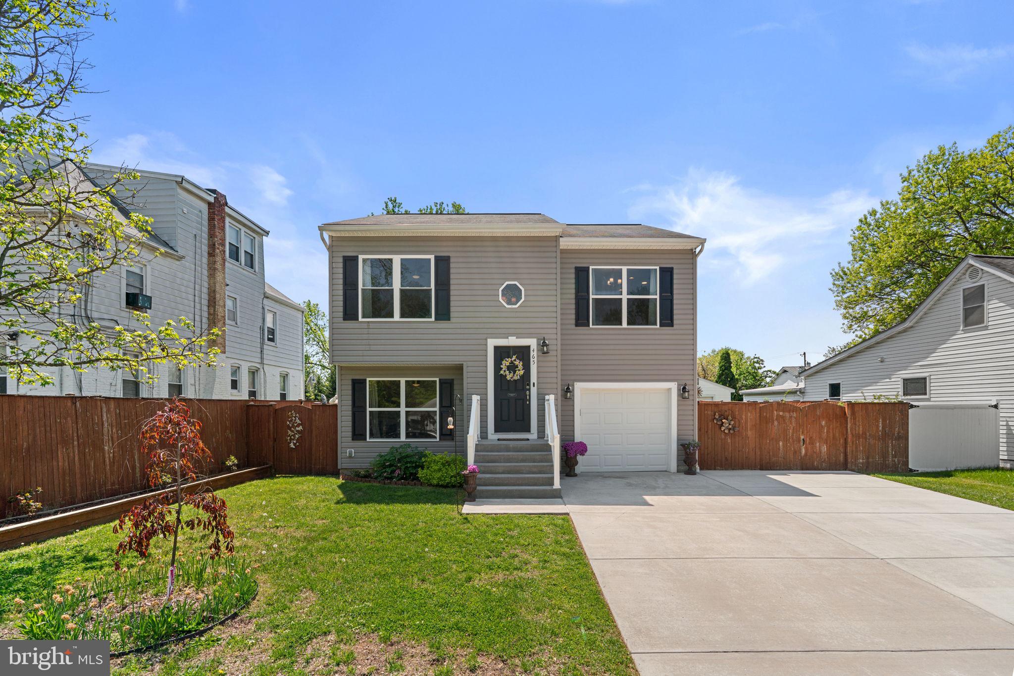 $10,000 Price Reduction! Built in 2016, this home offers the perfect blend of modern comfort, flexible living space, and outdoor enjoyment in a convenient location close to Fort Meade, Annapolis, and BWI Airport. This beautifully maintained 4-bedroom, 2.5-bath single-family home features an attached garage, thoughtfully designed living spaces, and an incredible outdoor setup ready to enjoy from day one.

The upper level features a bright and open living space with vaulted ceilings and a spacious eat-in kitchen complete with granite countertops and stainless steel appliances. The primary suite offers vaulted ceilings and a private en-suite bath, complemented by two additional bedrooms and a full hall bath. The lower level adds even more flexibility with a fourth bedroom, half bath, dedicated full-size laundry room, and additional living space ideal for a media room, home office, or play area.

Step outside to enjoy a fully fenced, spacious yard designed for both relaxation and entertaining. A gardener’s dream, the property already includes raised garden beds and a beautifully landscaped yard creating a private and functional outdoor retreat. Recent outdoor upgrades include a back patio off the lower level and a stone fire pit area perfect for gatherings. The front double-gate fence provides exceptional access and flexibility, with enough space to accommodate even an RV, boat, or additional vehicles.

Need additional parking? No problem! Ample parking on the driveway and garage completes the package. NO HOA! Don’t miss your chance to own this incredible home. Schedule your tour today!